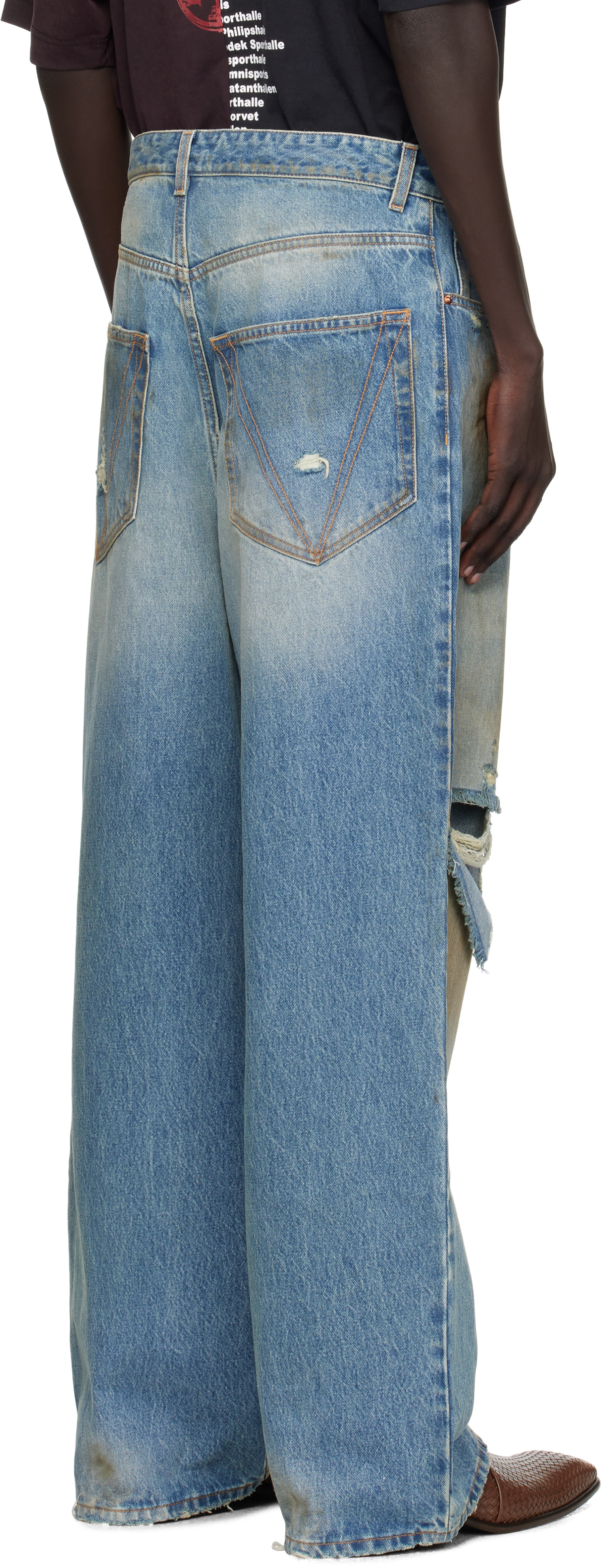 VETEMENTS - Jean ample bleu à effet usé