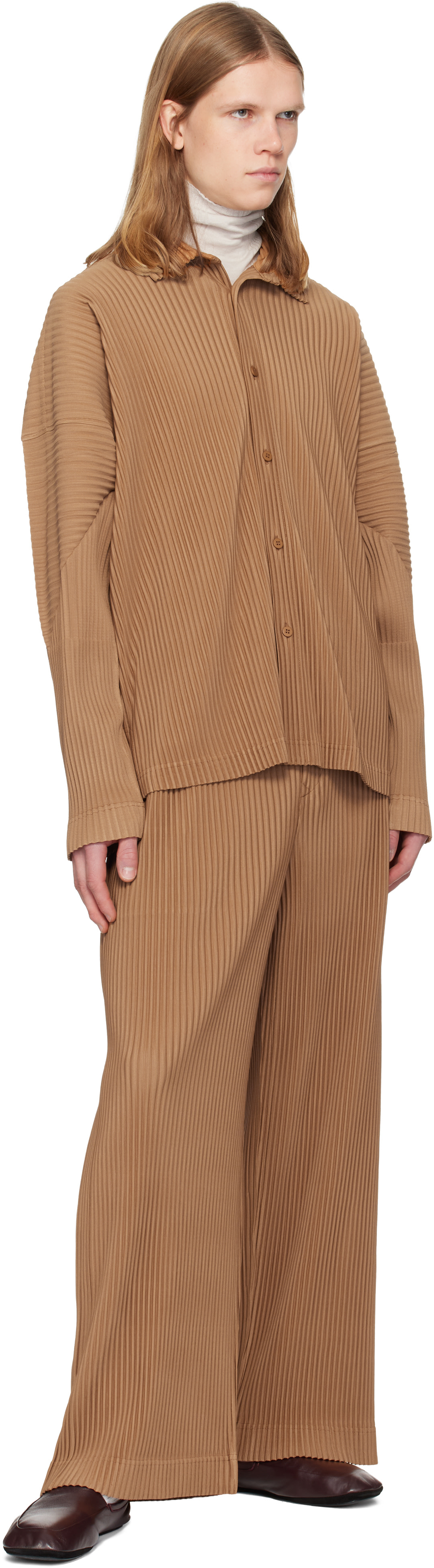 HOMME PLISSÉ ISSEY MIYAKE: Tan Monthly Colors October Trousers HOMME PLISSÉ ISSEY MIYAKE: Tan Monthly Colors October Trousers