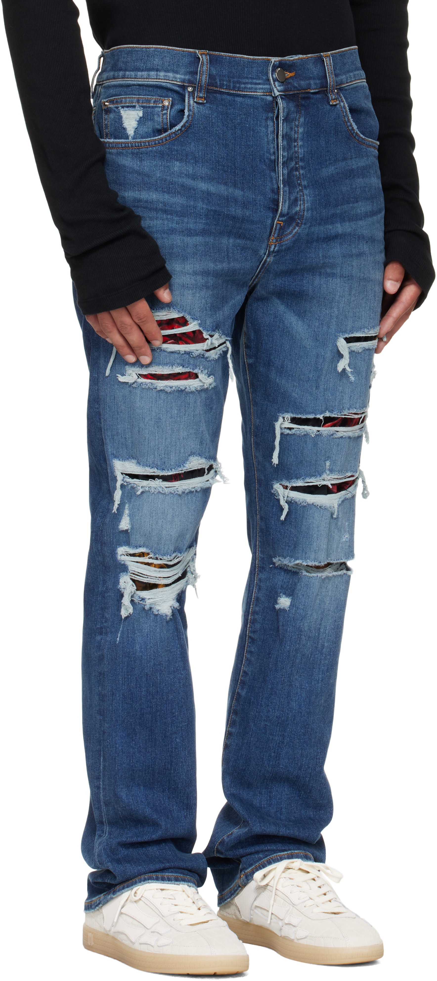AMIRI: Blue Floral Velvet Slim Thrasher Jeans | SSENSE