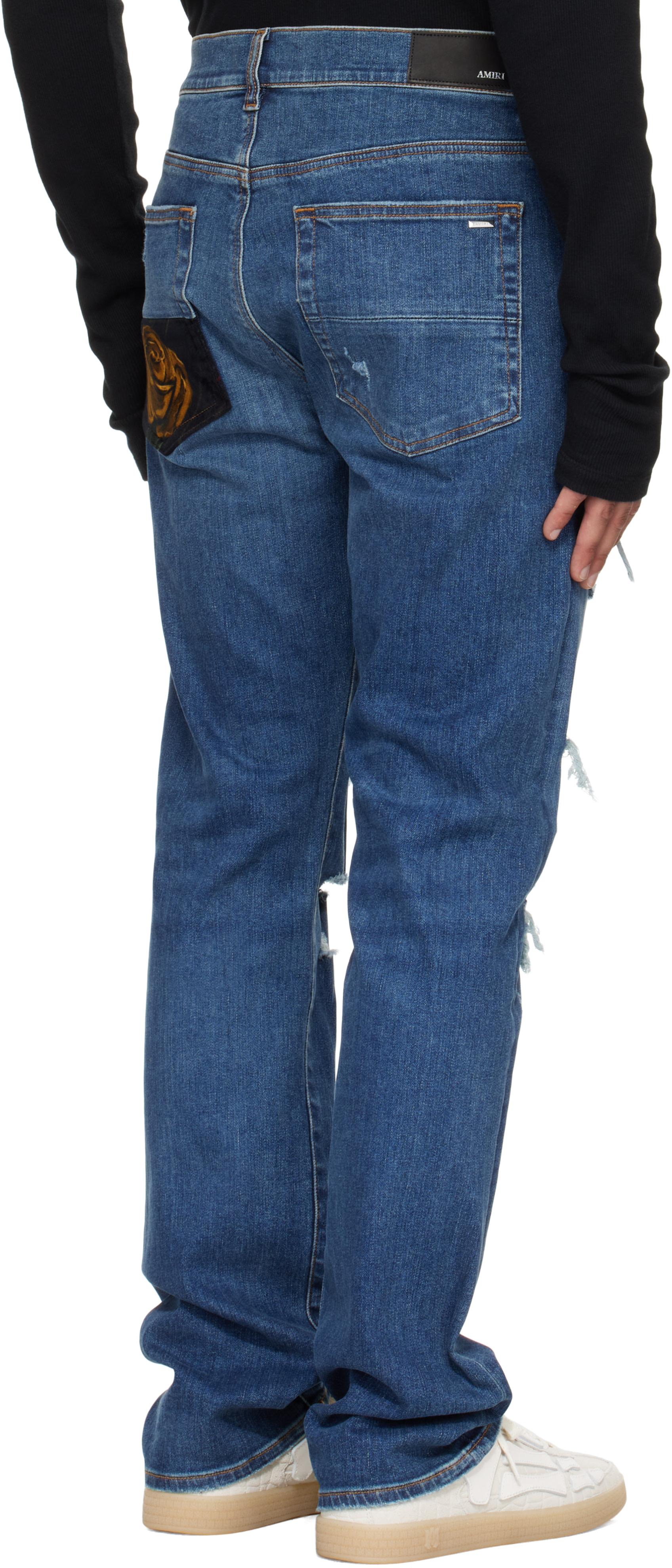 AMIRI: Blue Floral Velvet Slim Thrasher Jeans | SSENSE