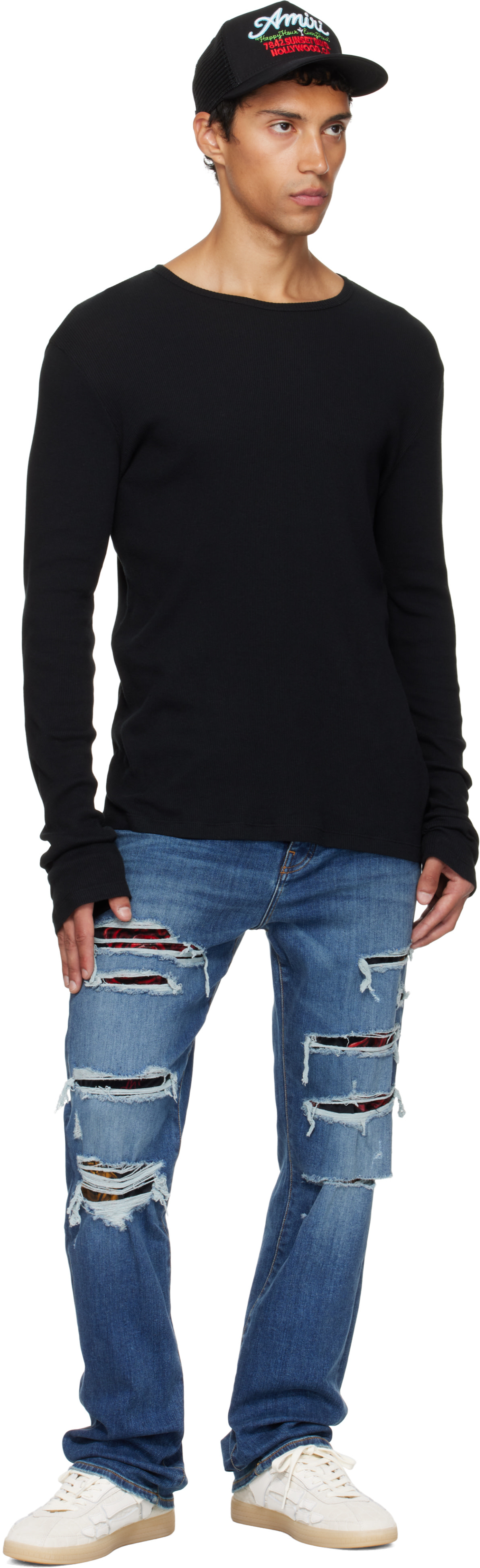 AMIRI: Blue Floral Velvet Slim Thrasher Jeans | SSENSE
