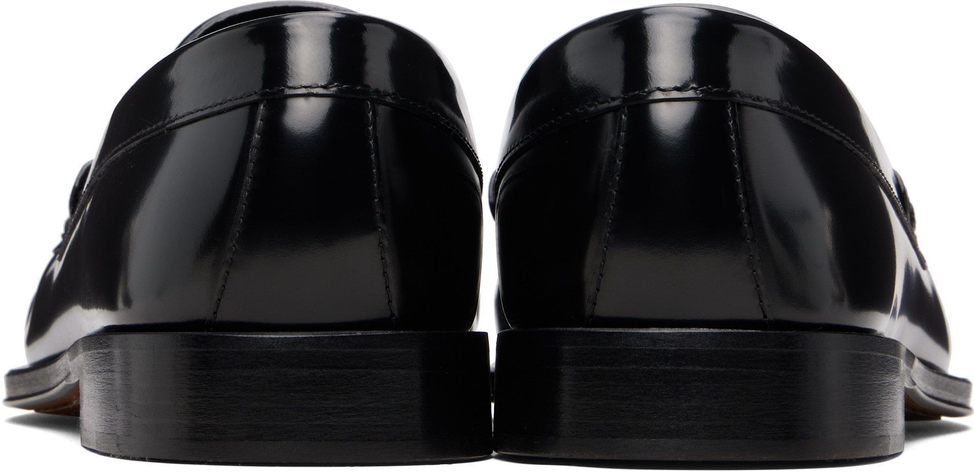 TOM FORD: Black Burnished Leather Penny Loafers | SSENSE display picture 1