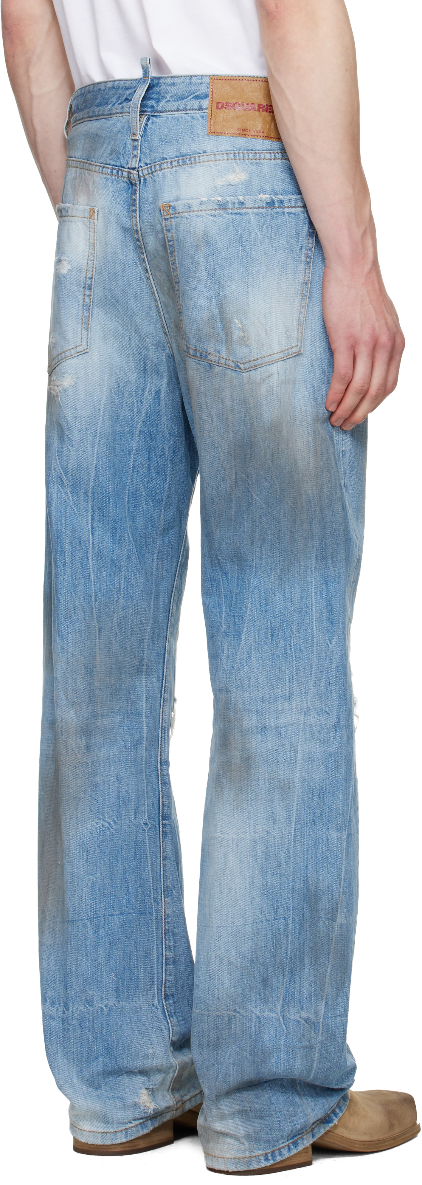 Dsquared2: Blue Light Dirty Wash Loose Twist Jeans | SSENSE