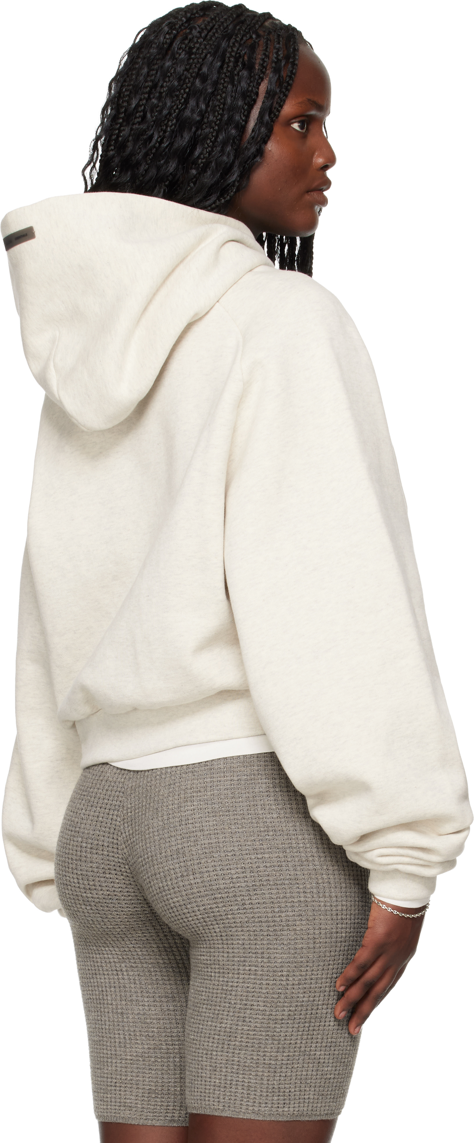 Fear of God ESSENTIALS - Pull à capuche 90s gris à logo gaufré et à manches raglan - Holiday