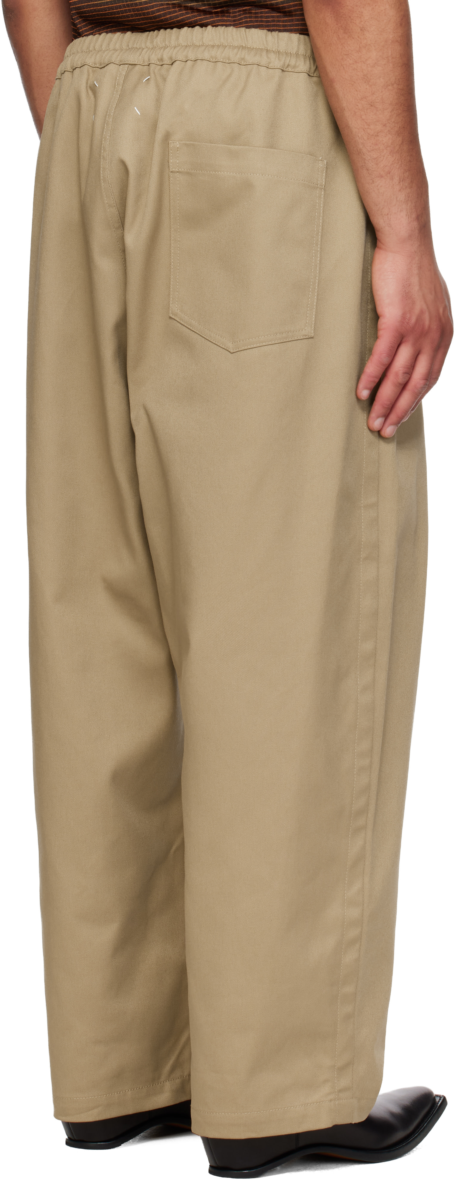 Maison Margiela: Beige Dropped-Rise Trousers | SSENSE