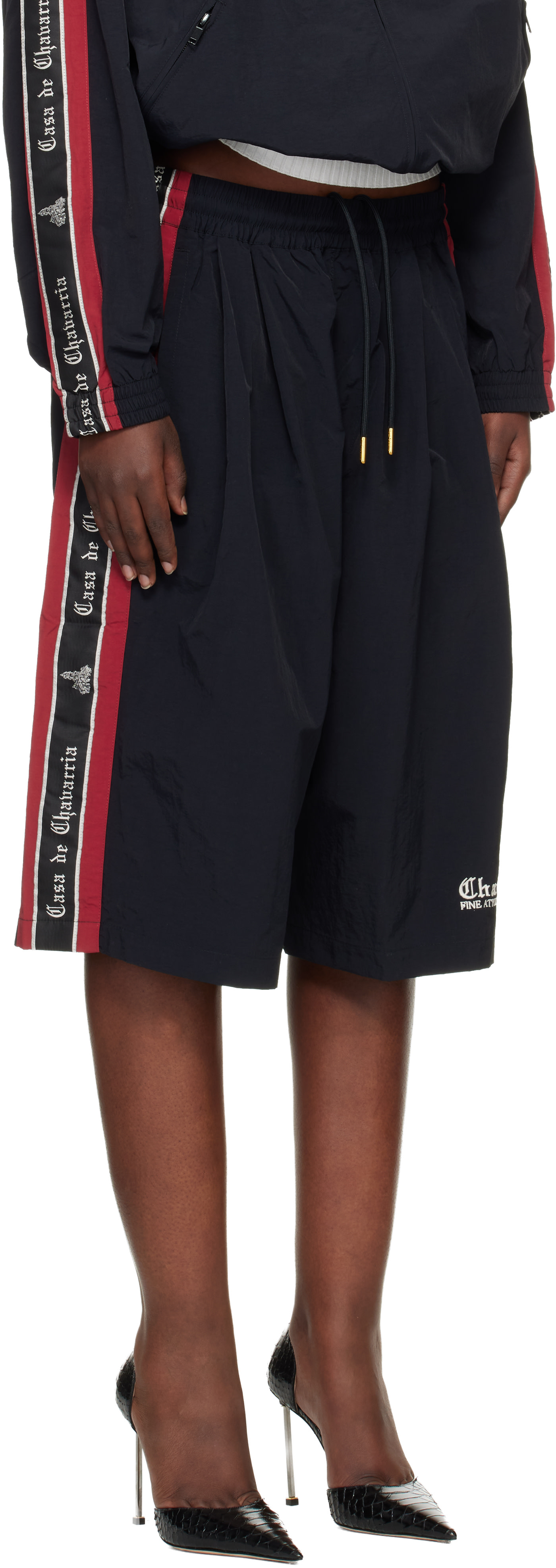 WILLY CHAVARRIA: Black 'Casa De Chavarria' Orale Track Shorts | SSENSE