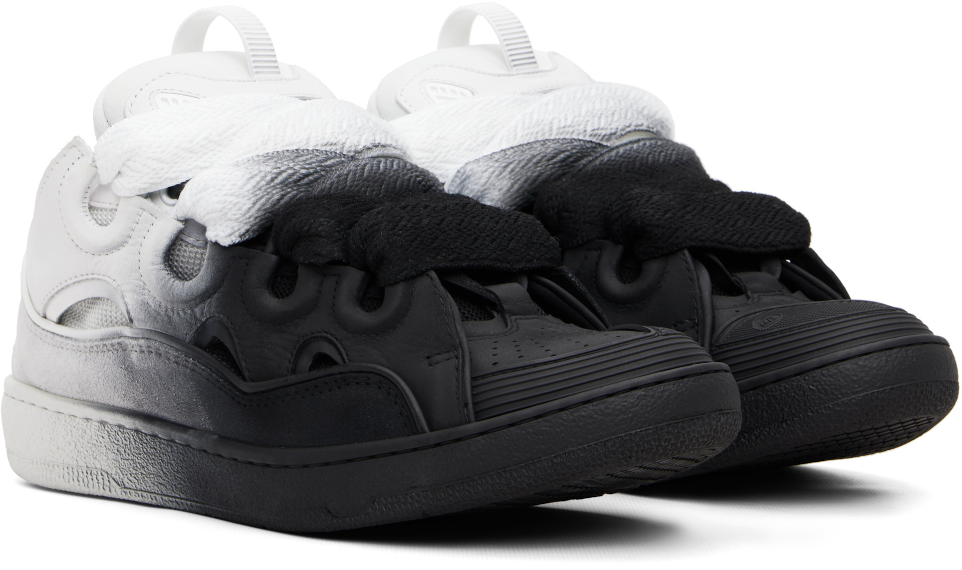 Lanvin: Black & Off-White Spray Curb Sneakers | SSENSE Canada