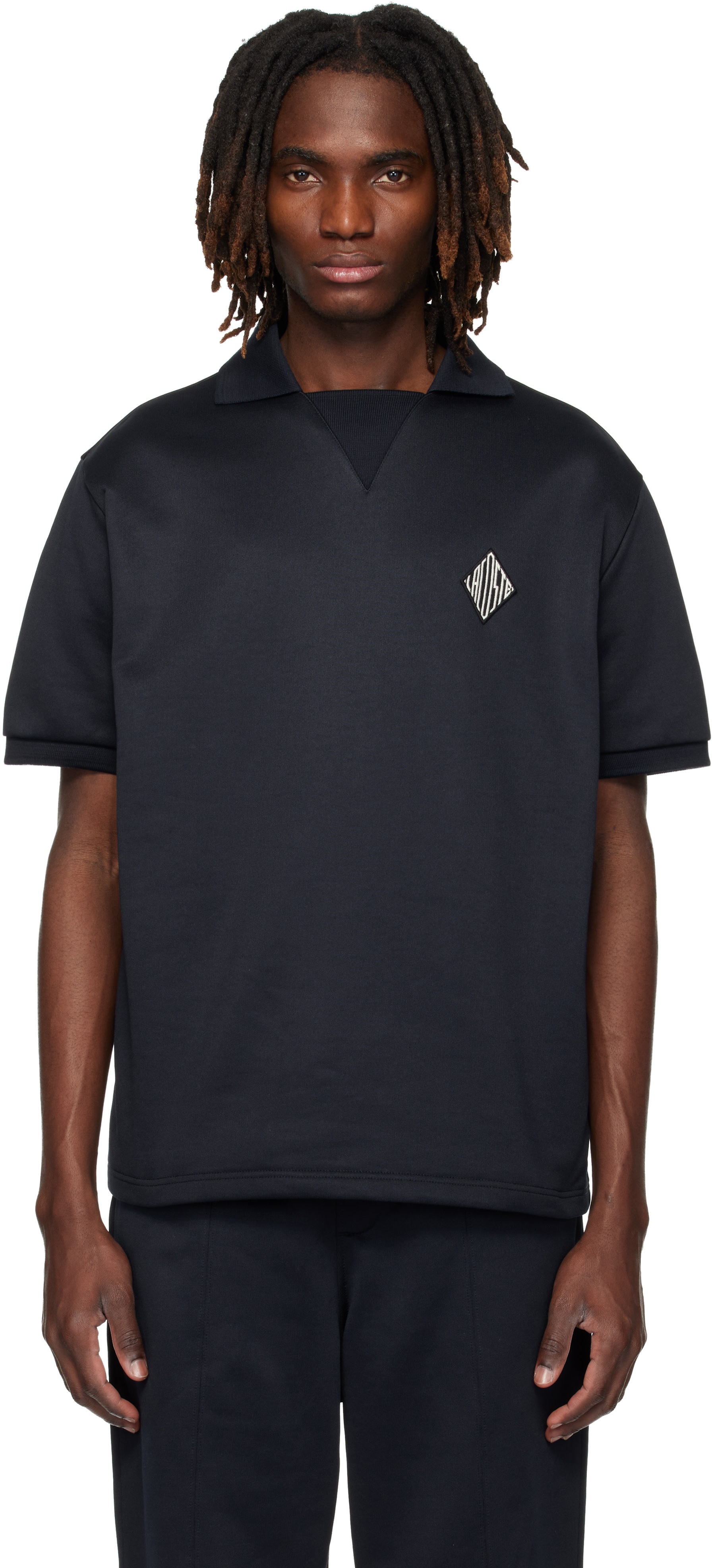 Lacoste - Polo décontracté noir en molleton à écusson