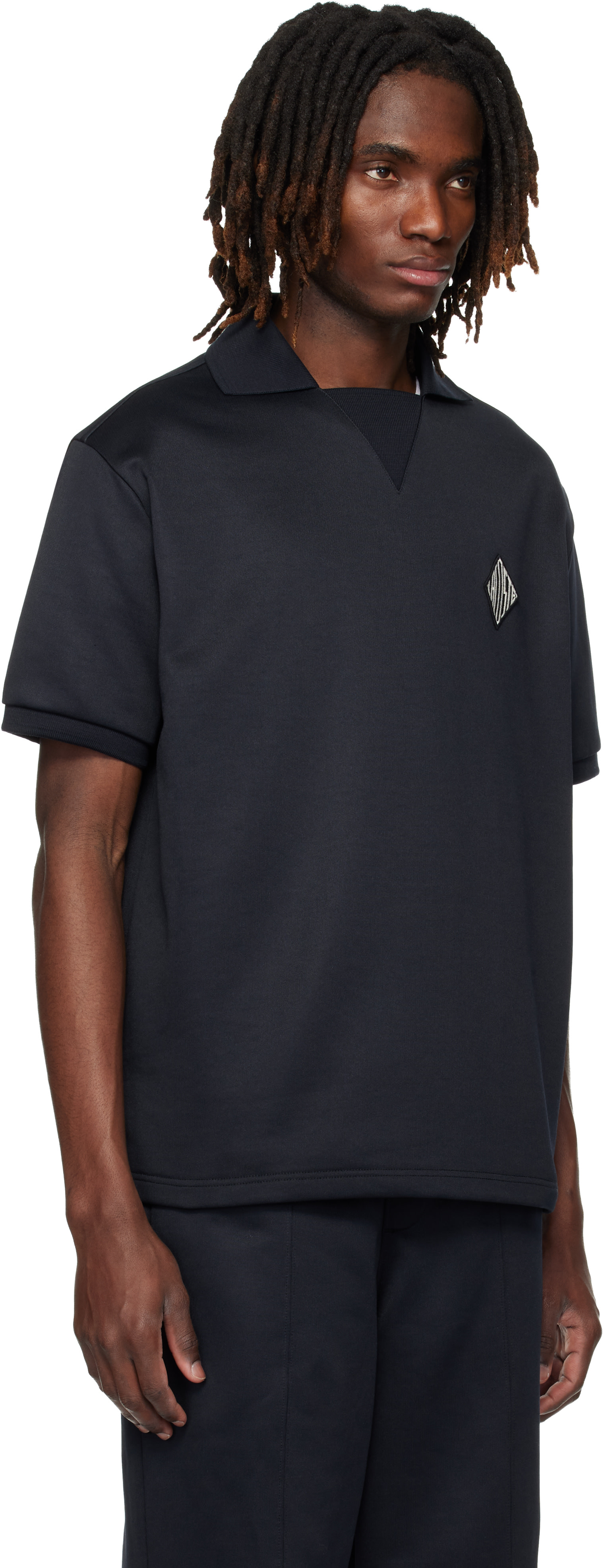 Lacoste - Polo décontracté noir en molleton à écusson