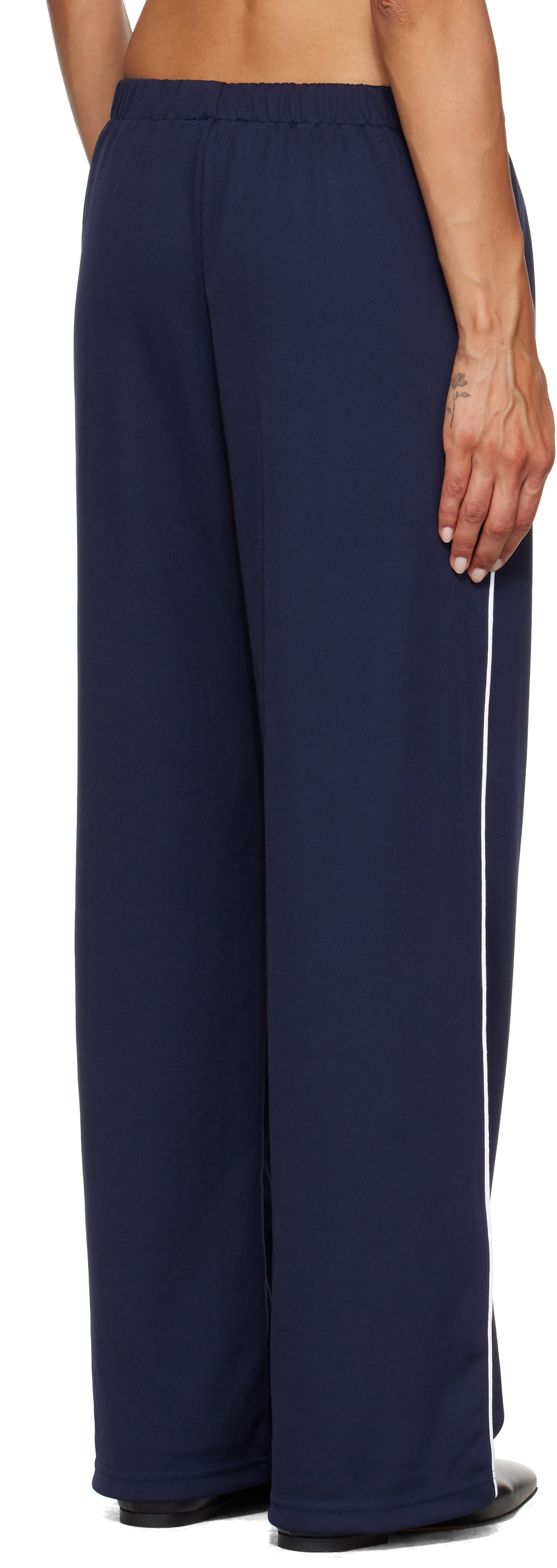Sporty & Rich: Navy Signature Logo Retro Track Pants | SSENSE