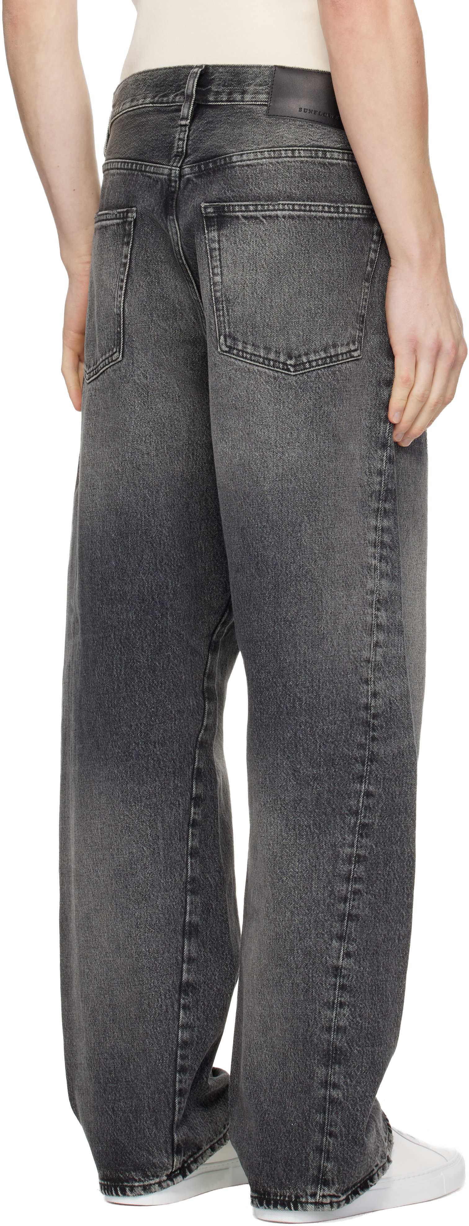 Sunflower: Black Wide Twist Jeans | SSENSE