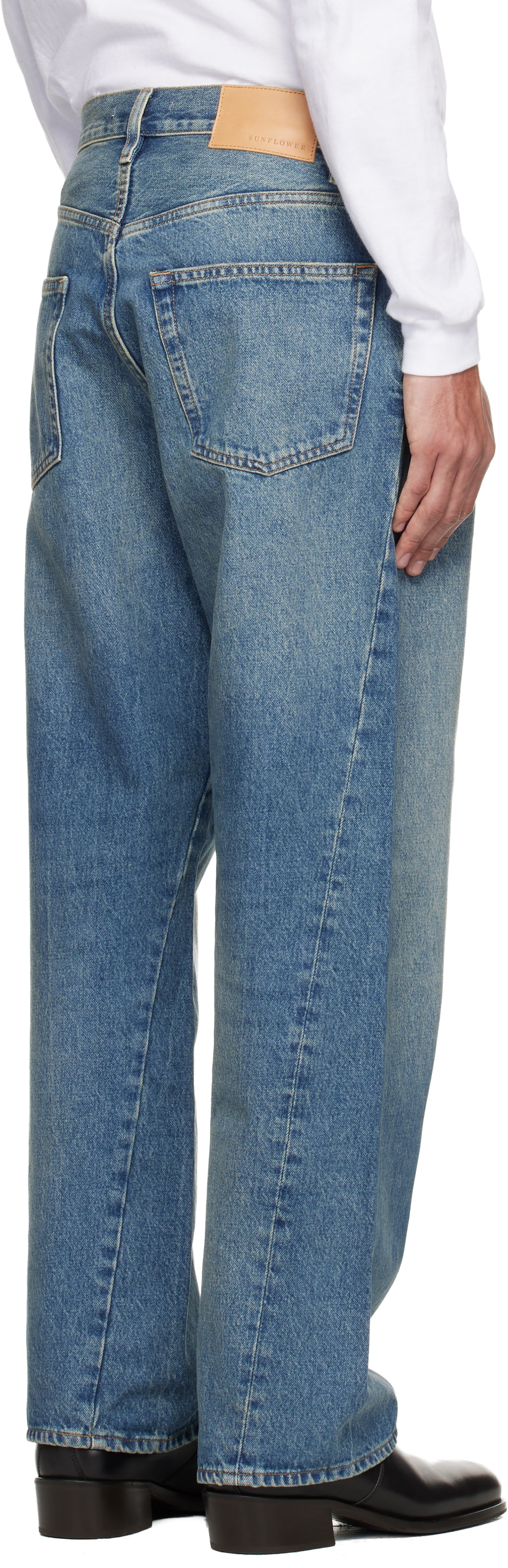 Sunflower: Blue Wide Twist Jeans | SSENSE