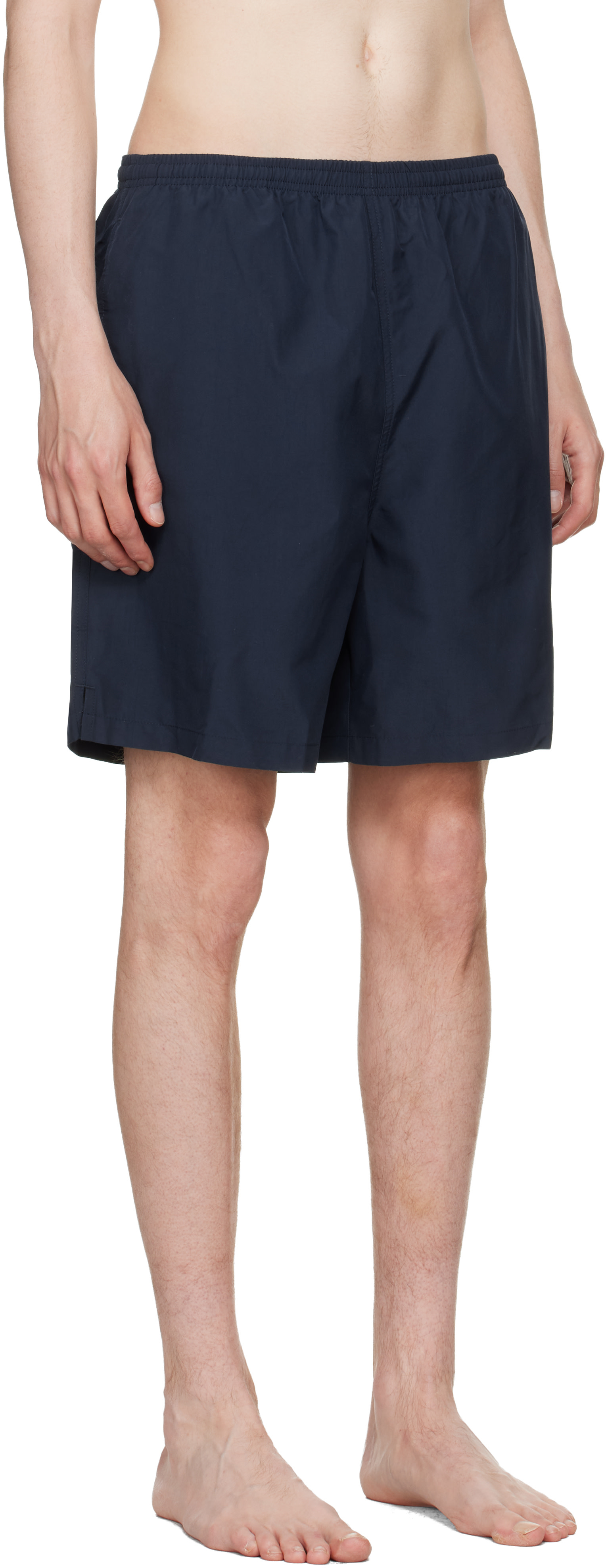 AMI Paris: Navy Long Plain Swim Shorts | SSENSE