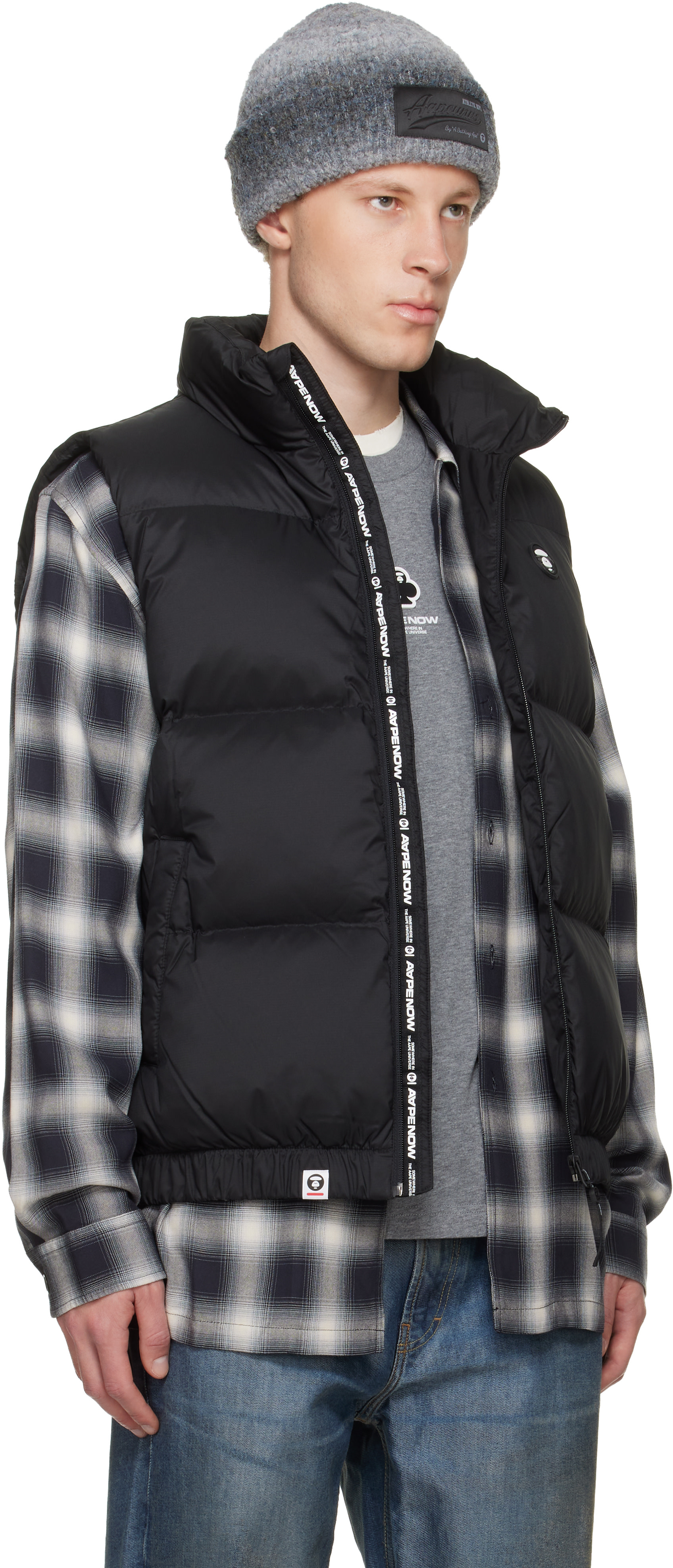 AAPE by A Bathing Ape: Black 'AAPENOW' Moonface Down Vest | SSENSE