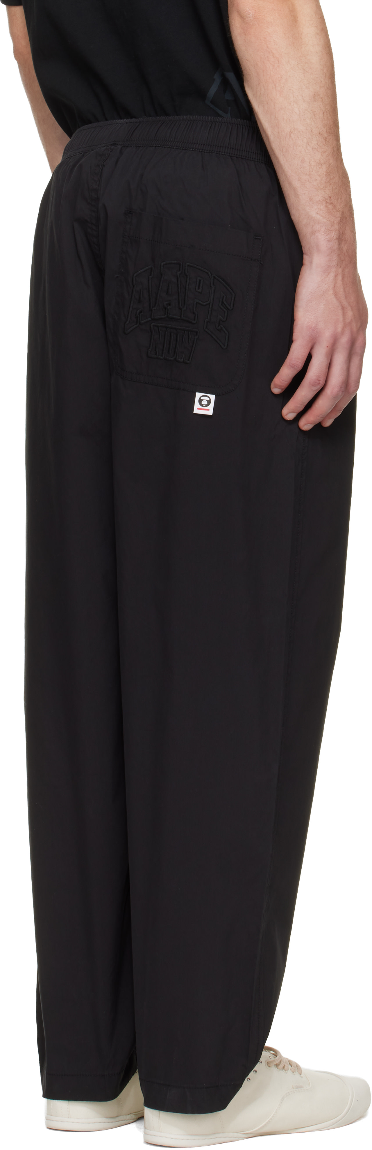 AAPE by A Bathing Ape: Black 'AAPE NOW' Woven Trousers | SSENSE