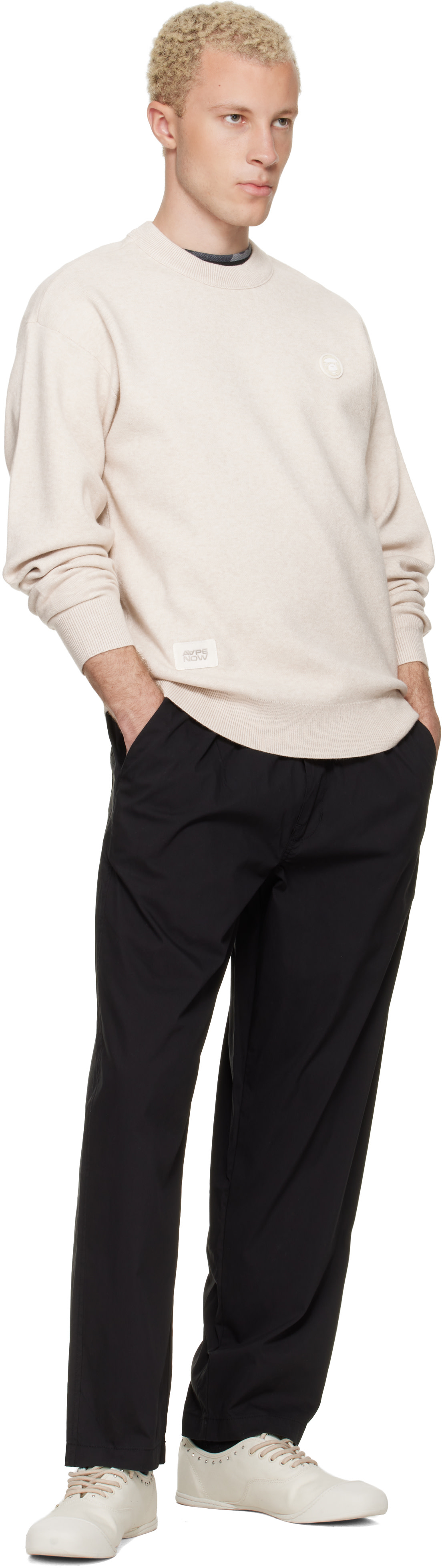 AAPE by A Bathing Ape: Black 'AAPE NOW' Woven Trousers | SSENSE