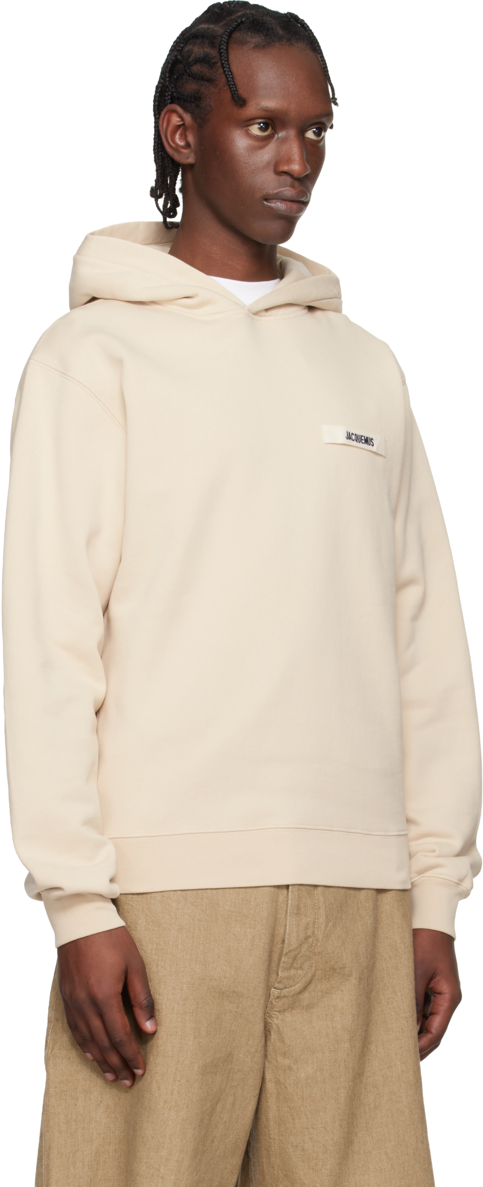 JACQUEMUS - Pull à capuche beige à écusson en gros-grain