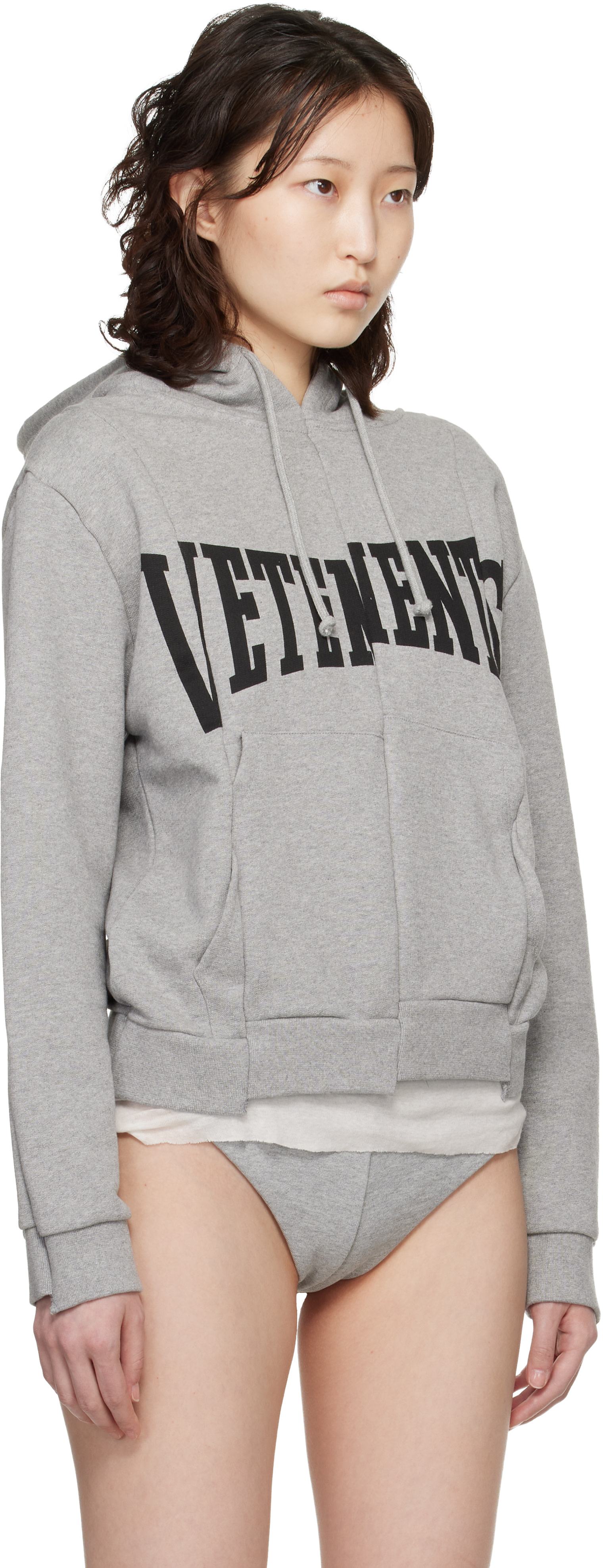 VETEMENTS: Gray Cut Up Logo Fitted Hoodie | SSENSE