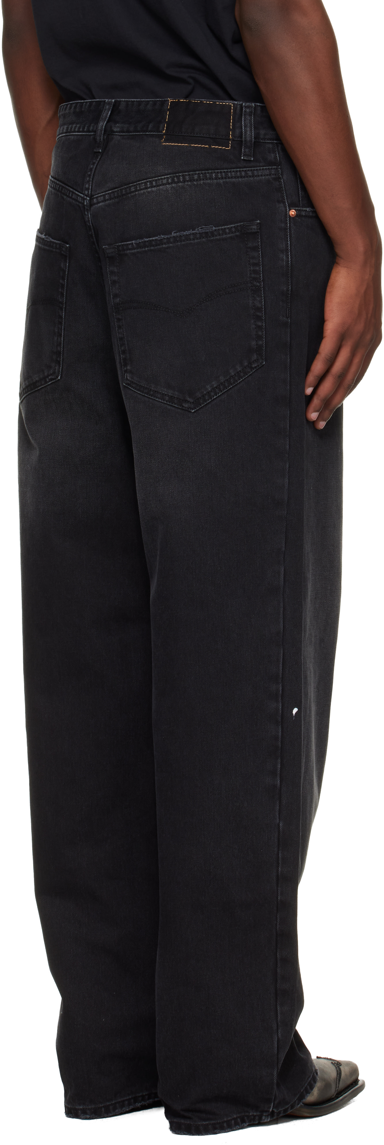VETEMENTS - Jean noir à déchirures