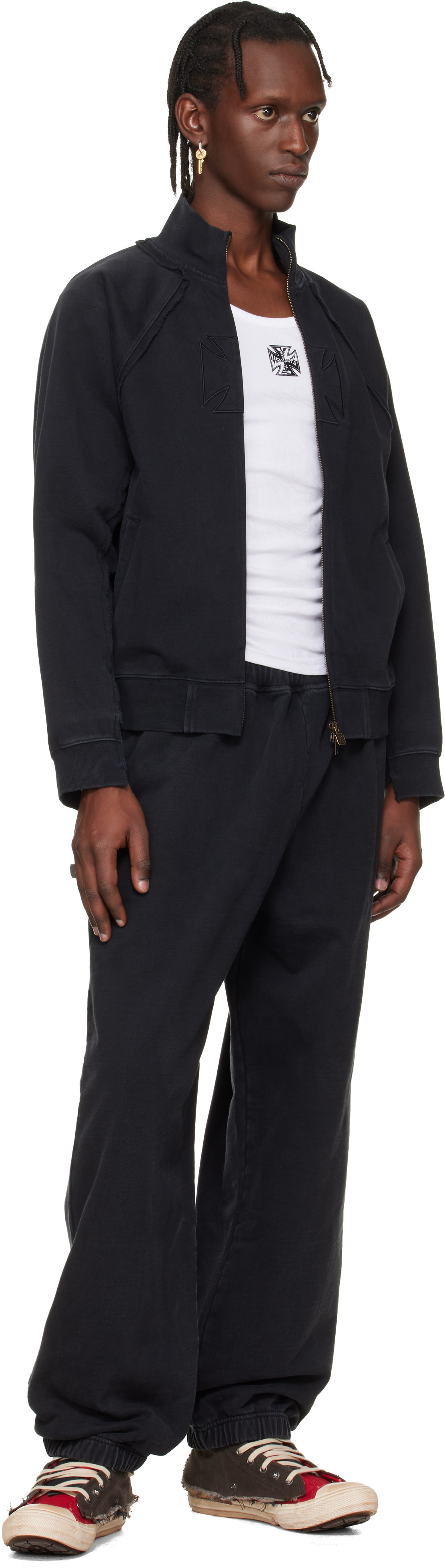 VETEMENTS: Black Biker Cross Logo Sweatpants | SSENSE