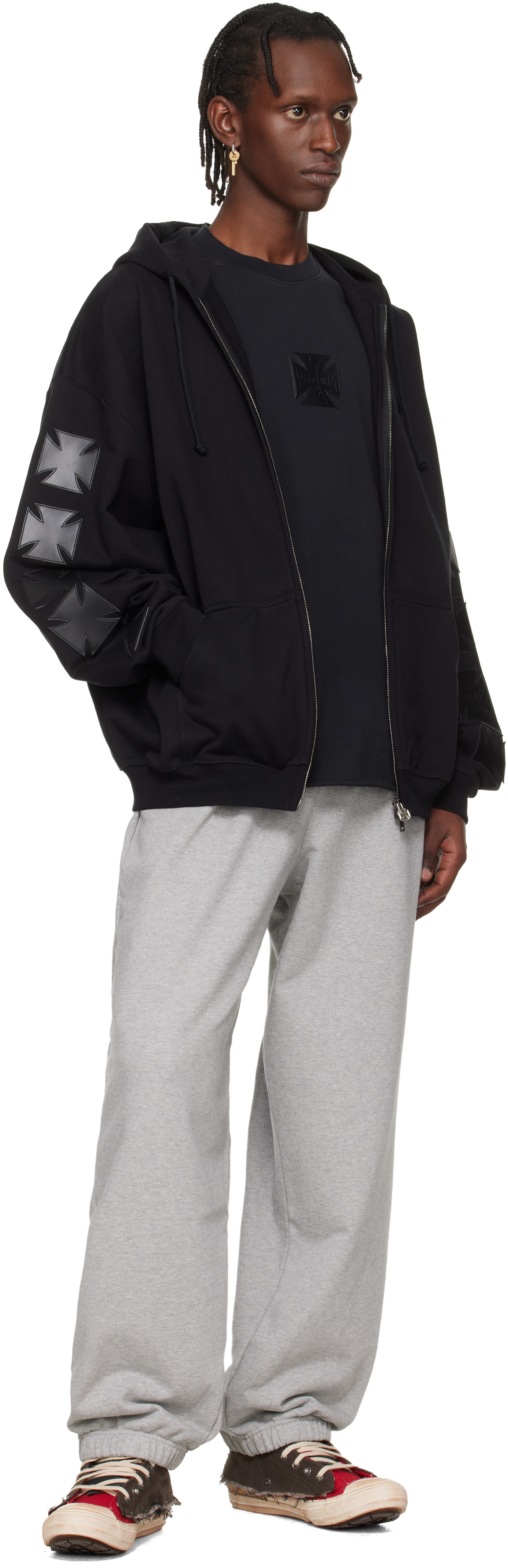 VETEMENTS: Gray Biker Cross Logo Sweatpants | SSENSE