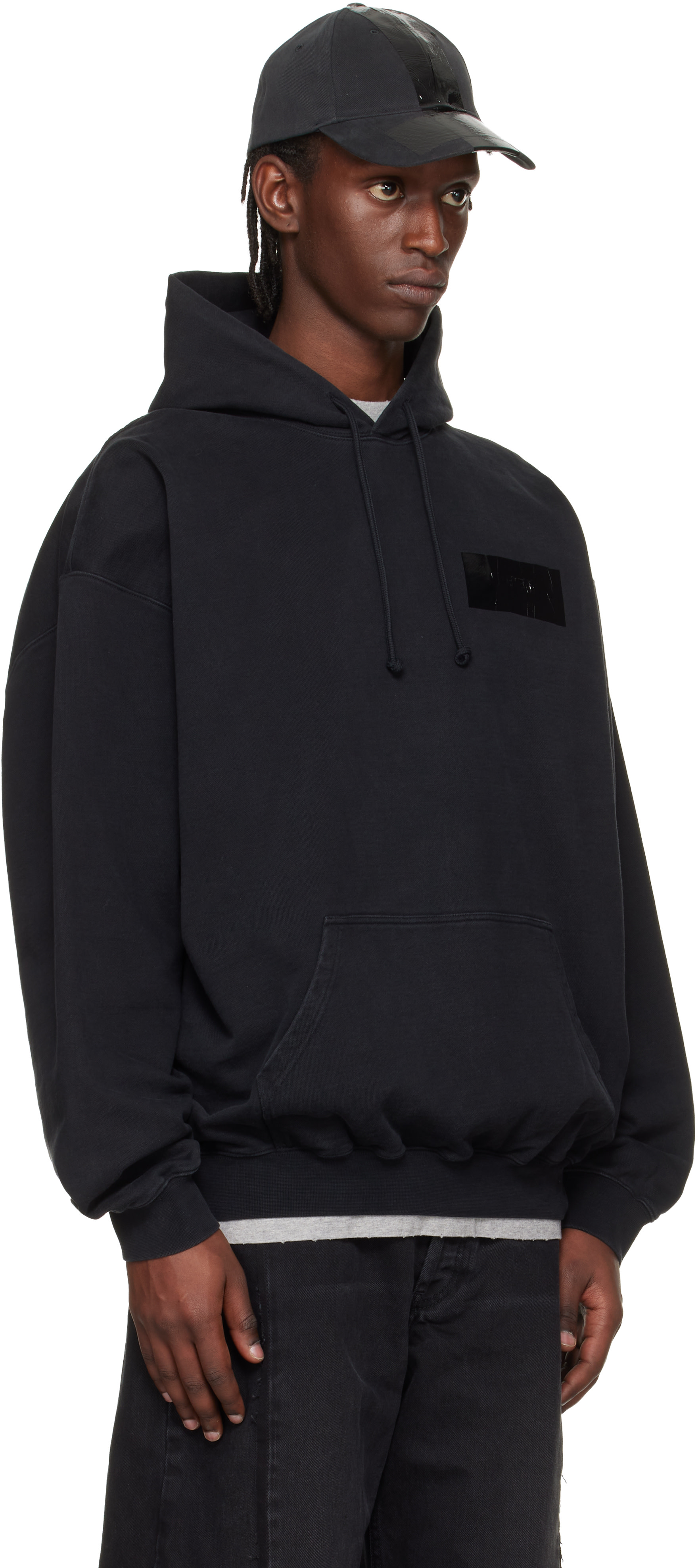 VETEMENTS - Pull à capuche noir à appliqués de ruban