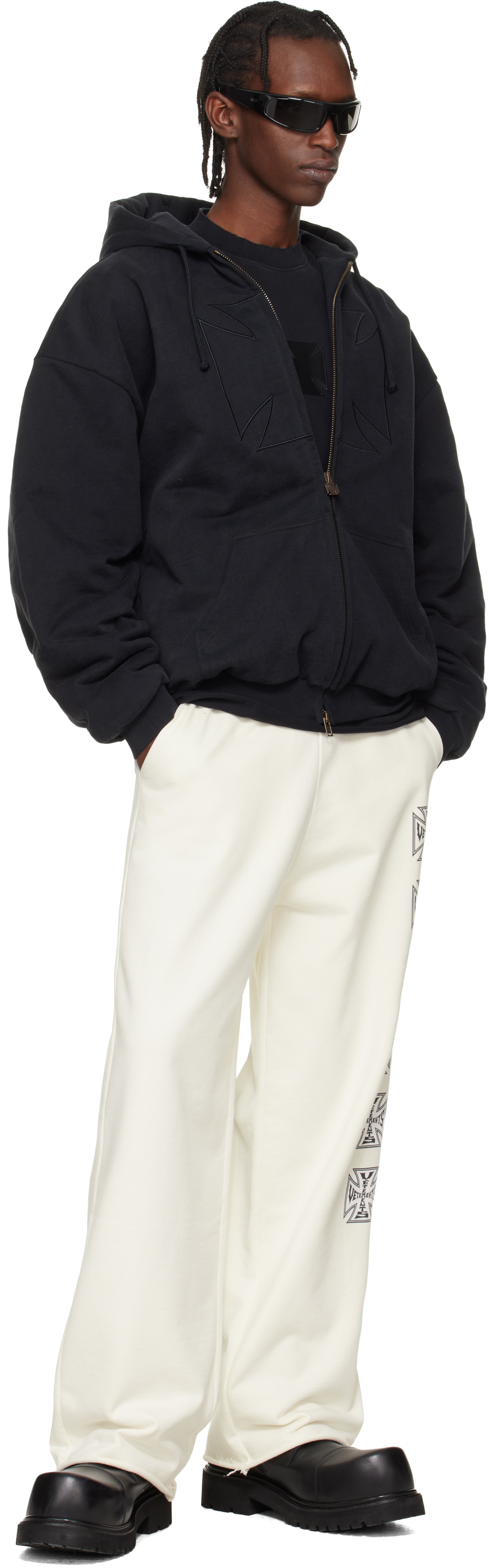VETEMENTS: Black Embroidered Cross Padded Zip-Up Hoodie | SSENSE