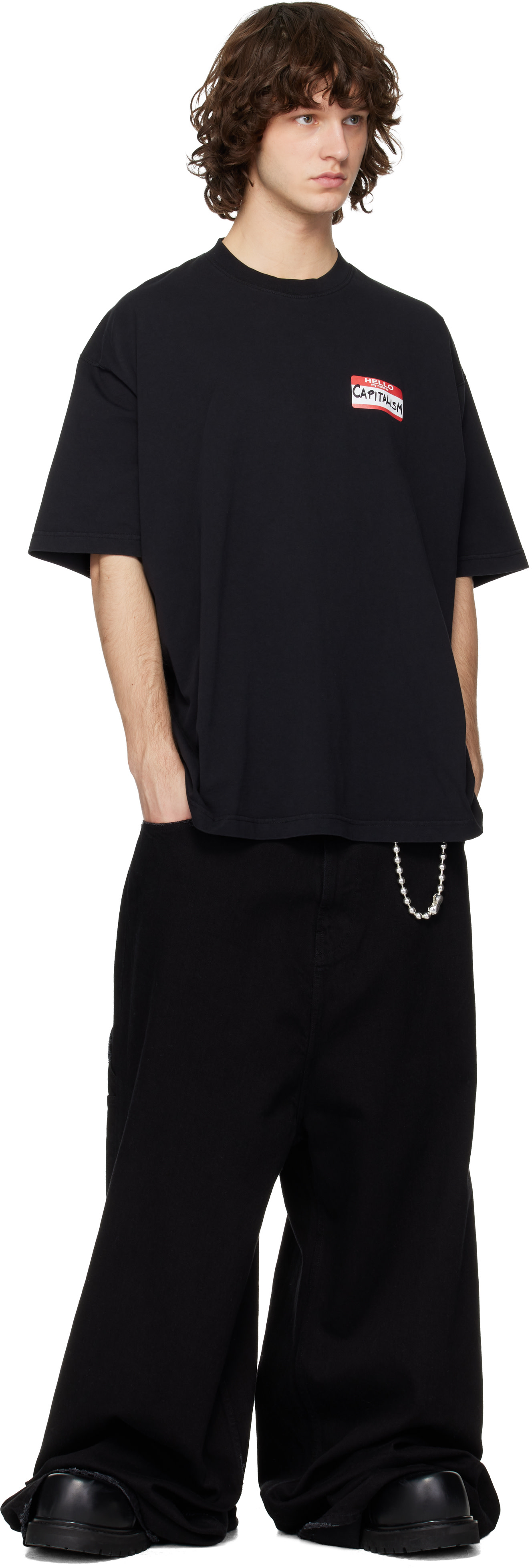 VETEMENTS: Black Sticker T-shirt | SSENSE Singapore