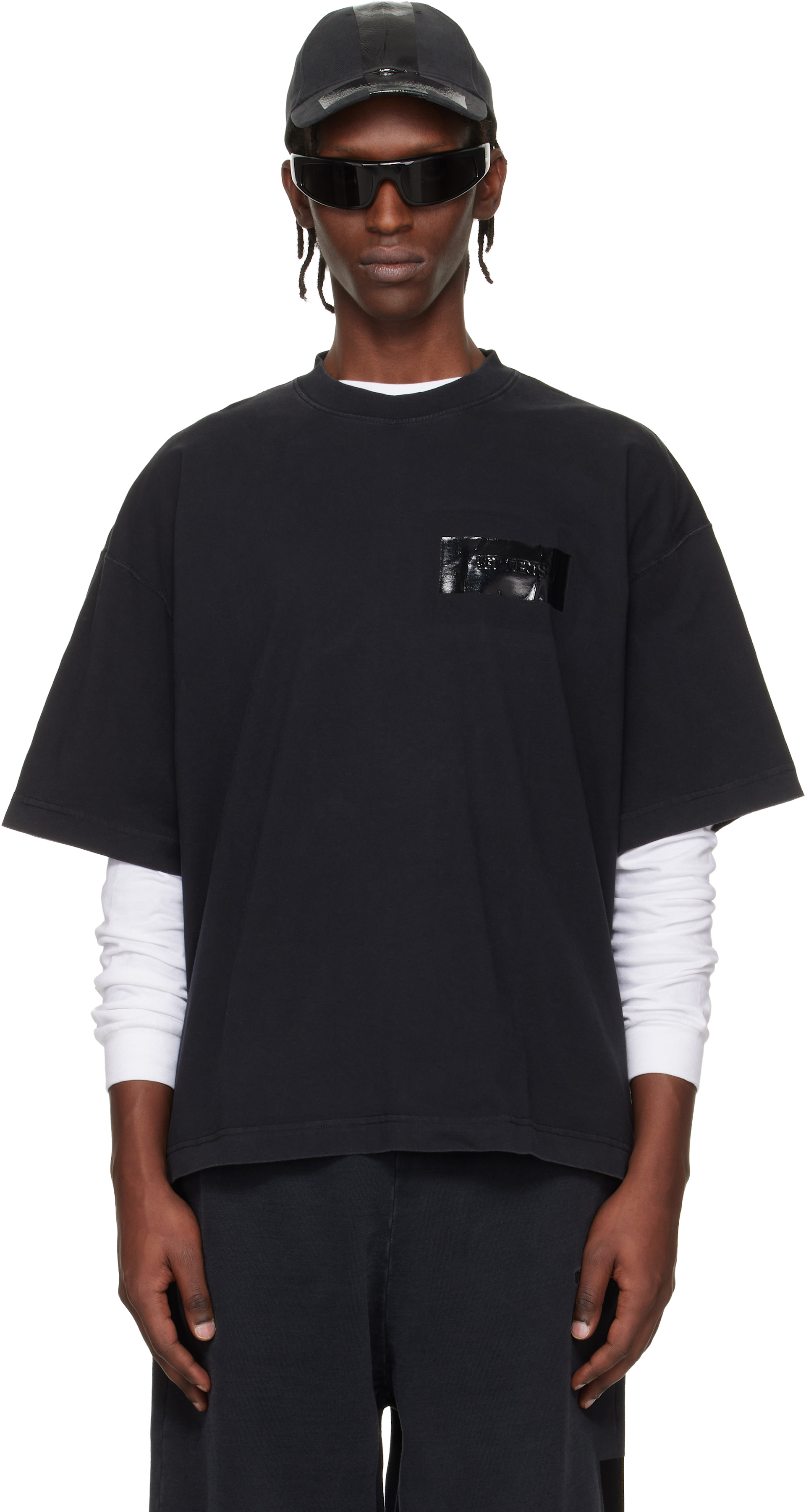 VETEMENTS: Black Taped Logo T-shirt | SSENSE