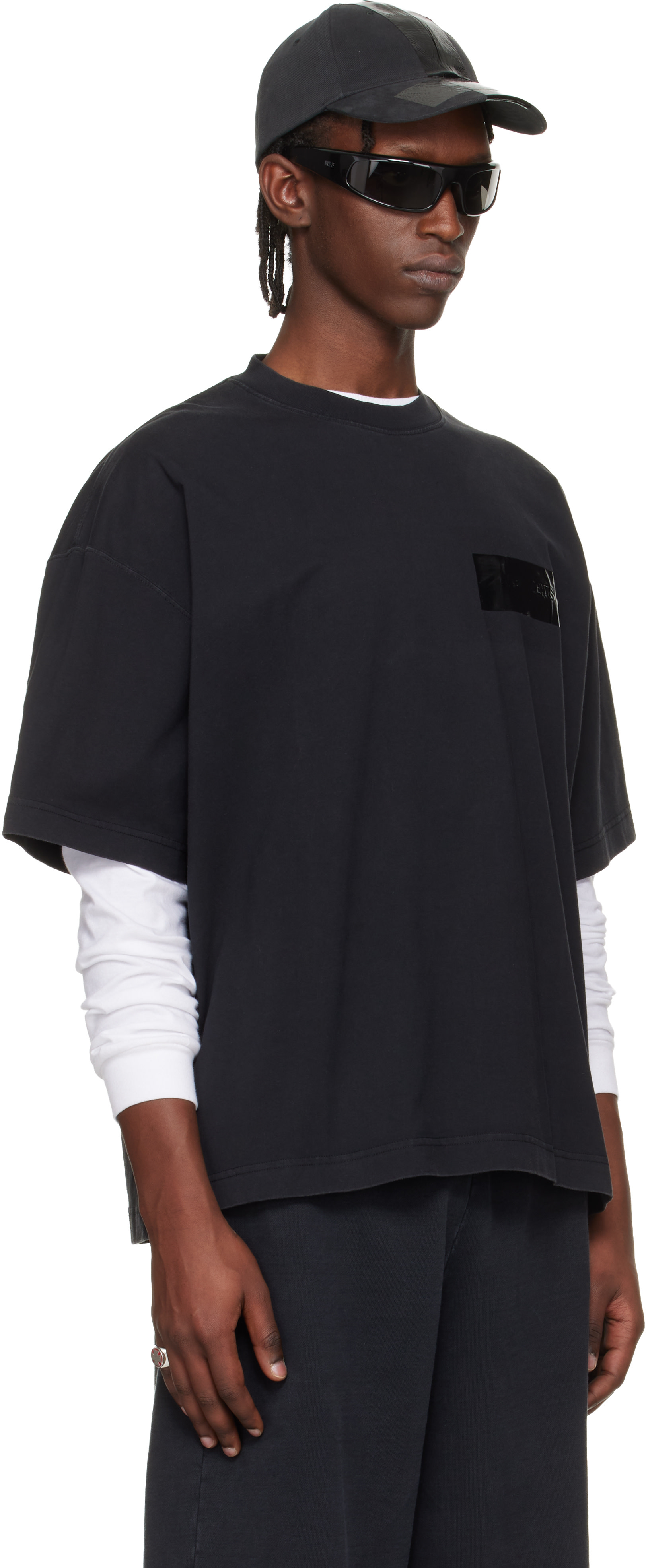 VETEMENTS: Black Taped Logo T-shirt | SSENSE