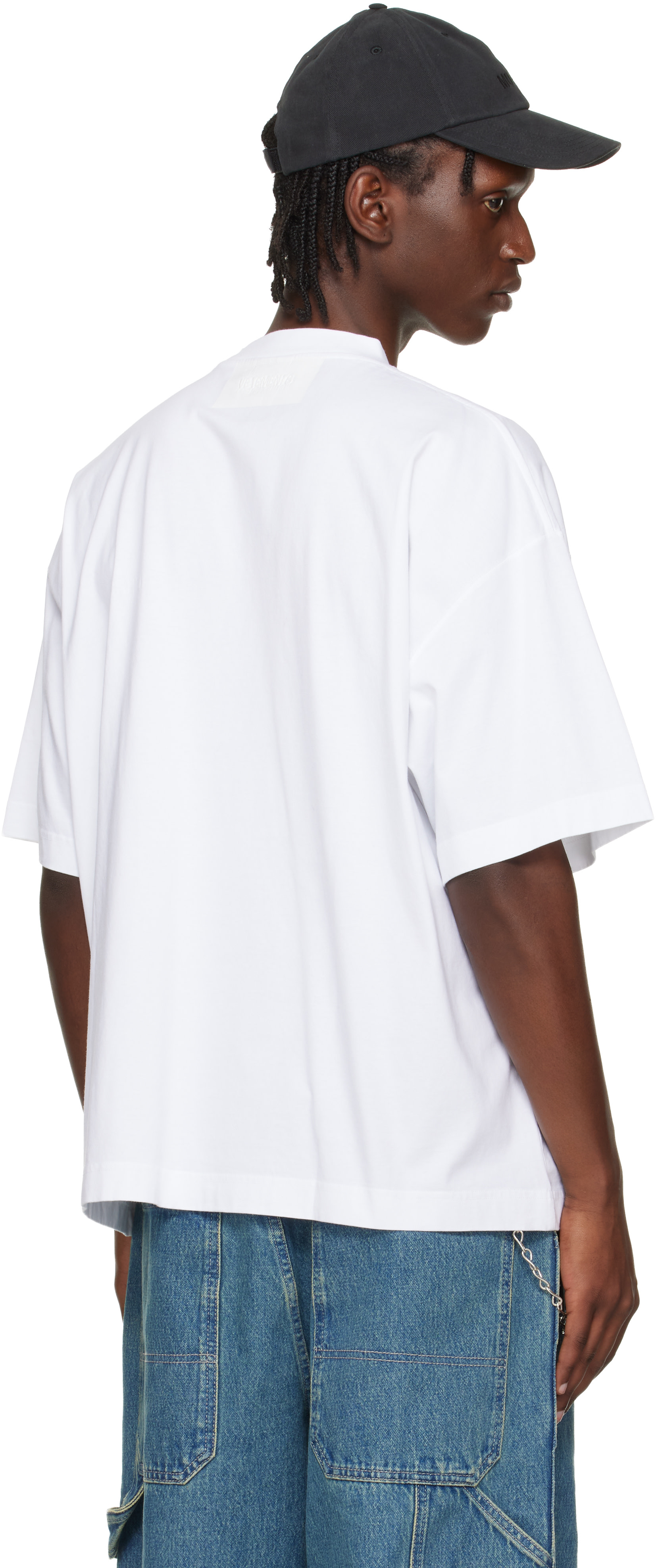 VETEMENTS: White Taped Logo T-shirt | SSENSE