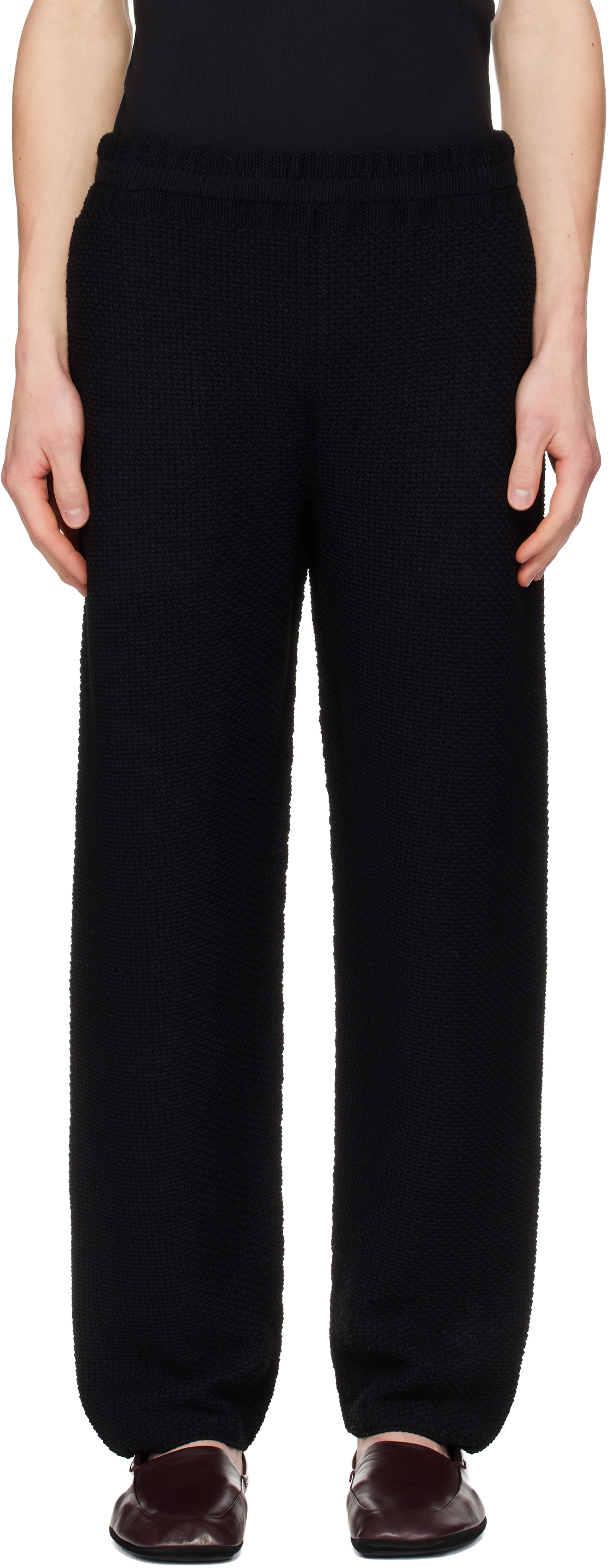 HOMME PLISSÉ ISSEY MIYAKE: Black Rustic Knit Sweatpants | SSENSE