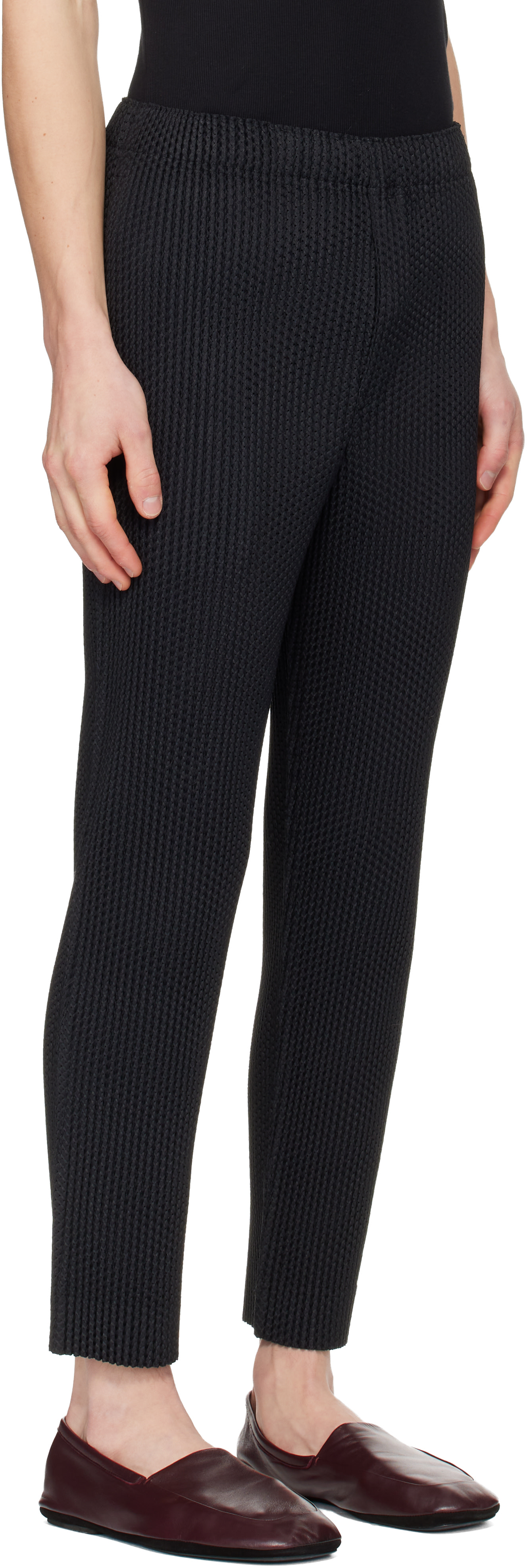 HOMME PLISSÉ ISSEY MIYAKE: Black Wickerwork Mesh Trousers | SSENSE