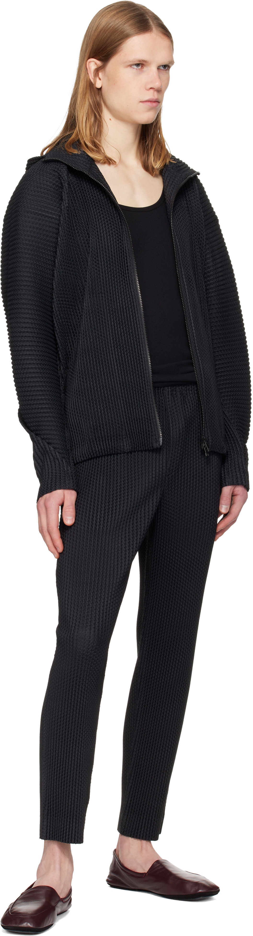 HOMME PLISSÉ ISSEY MIYAKE: Black Wickerwork Mesh Trousers | SSENSE