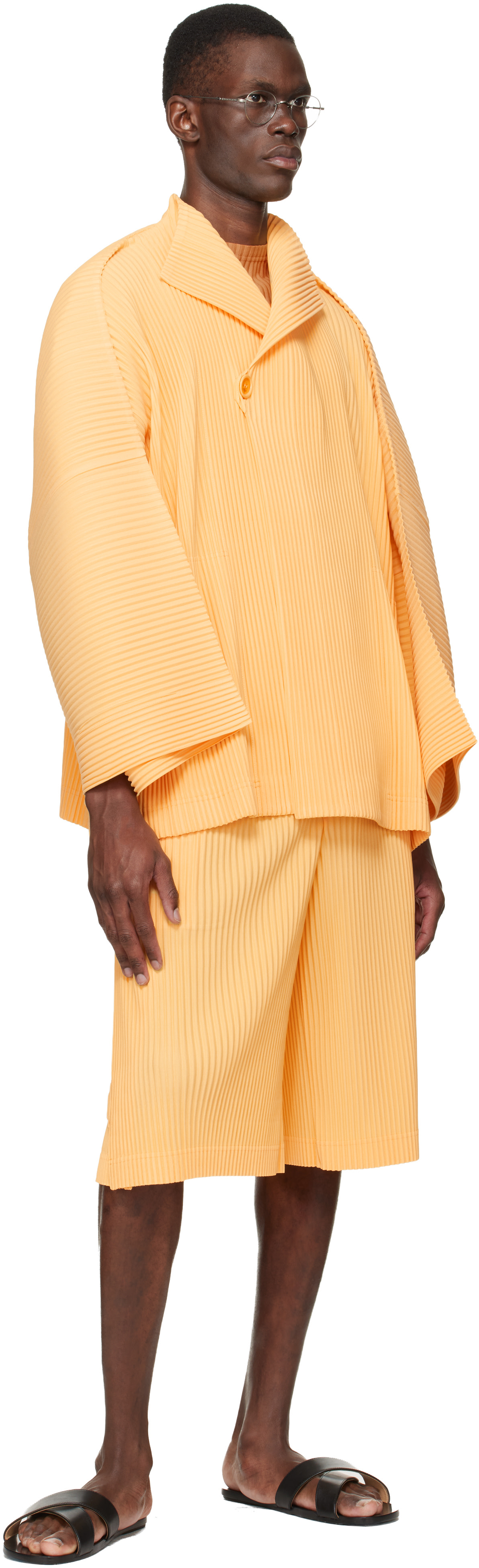 HOMME PLISSÉ ISSEY MIYAKE: Yellow Wear Or Wrap Shorts | SSENSE