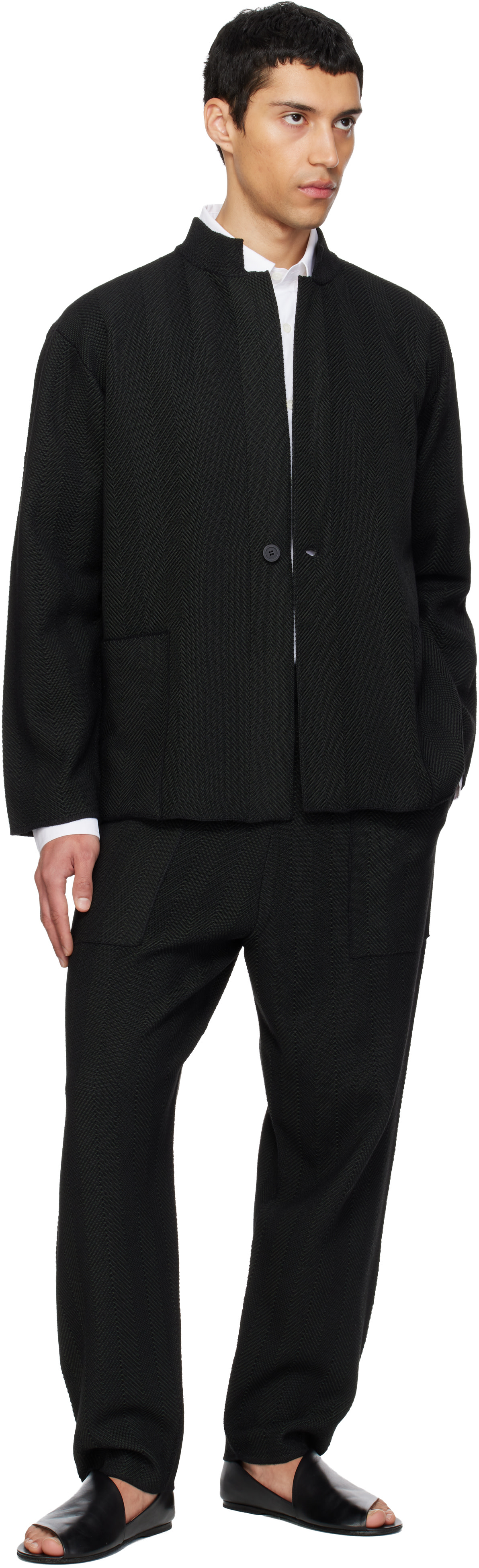 HOMME PLISSÉ ISSEY MIYAKE: Black Inlaid Knit Trousers | SSENSE