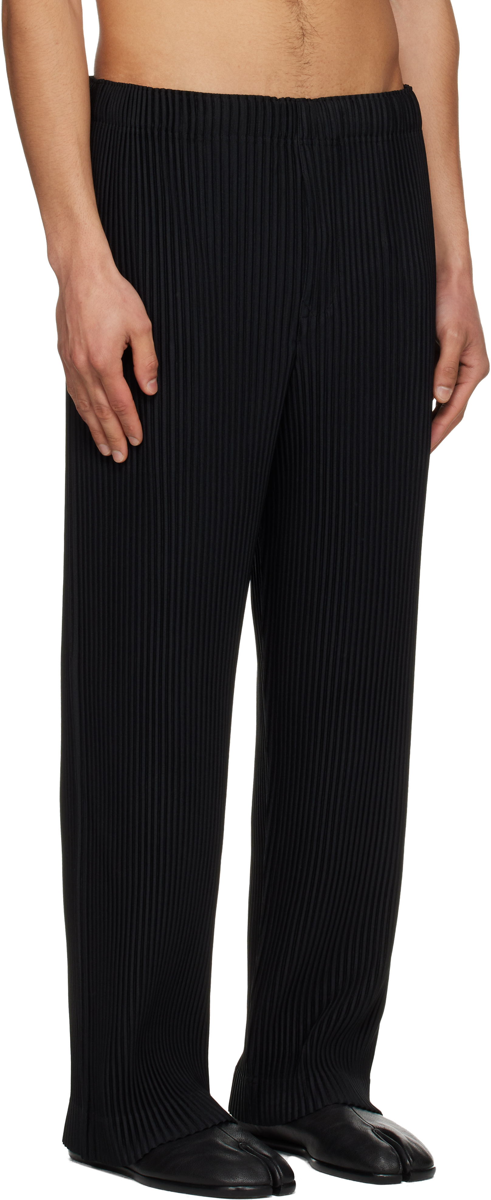 HOMME PLISSÉ ISSEY MIYAKE: Black Color Pleats 1 Trousers | SSENSE