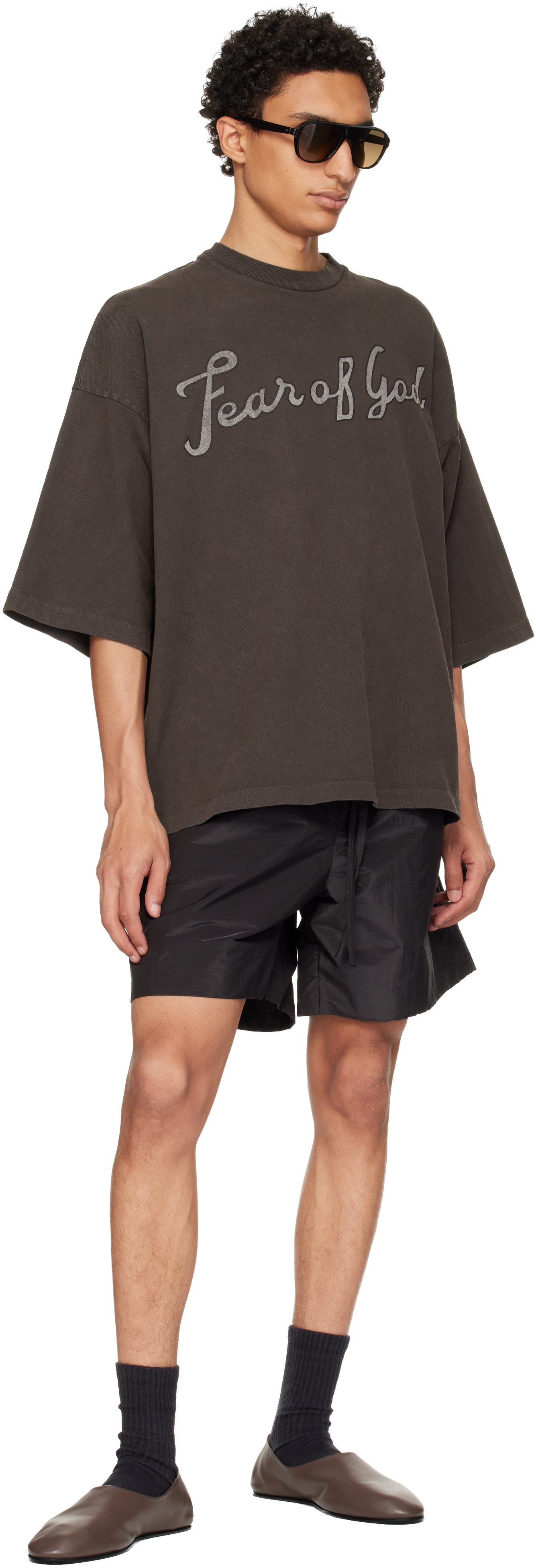 Fear of God: Black Nylon Taffeta Padded Sport Shorts | SSENSE