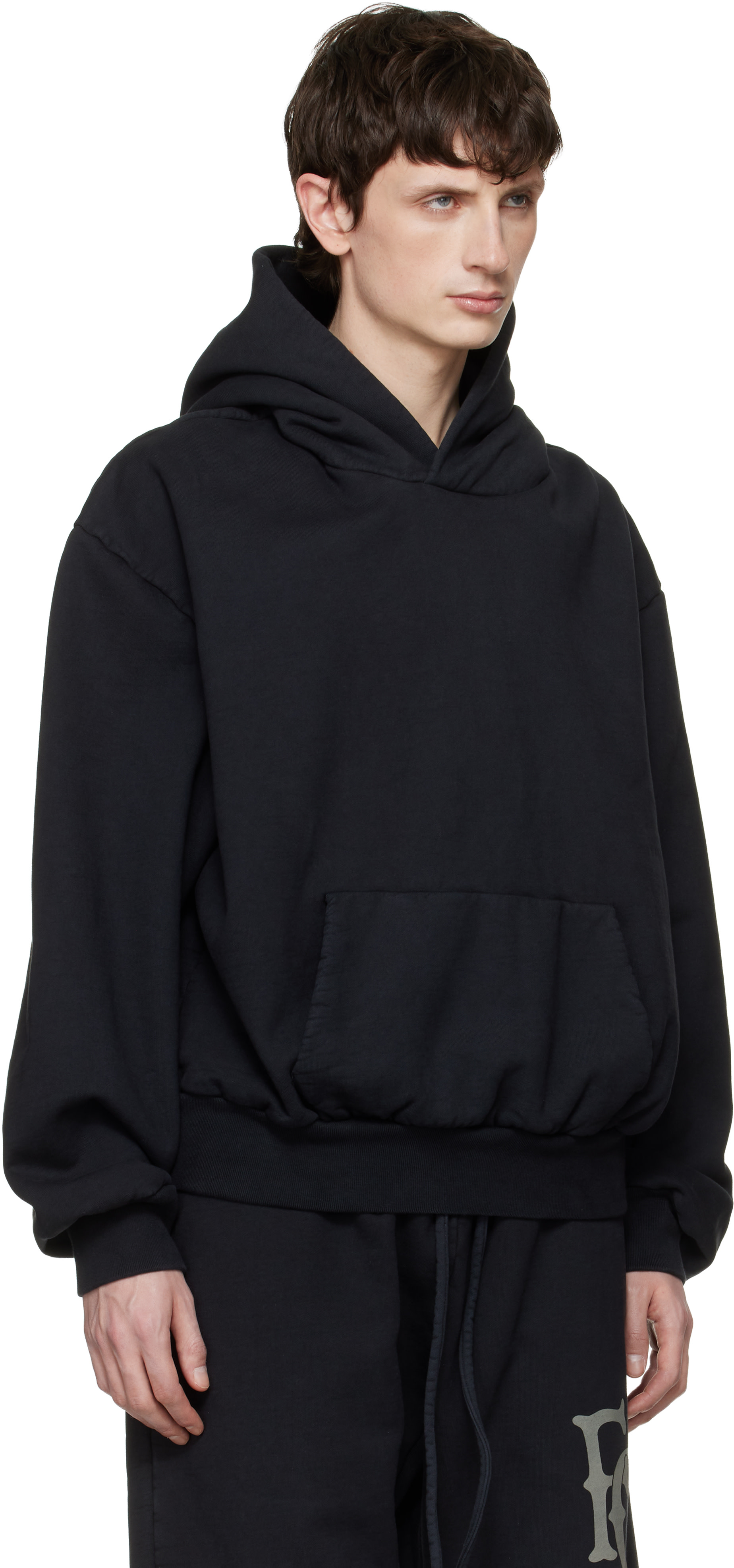Fear of God: Black Sunfaded Classic Half Raglan Pocket Hoodie | SSENSE