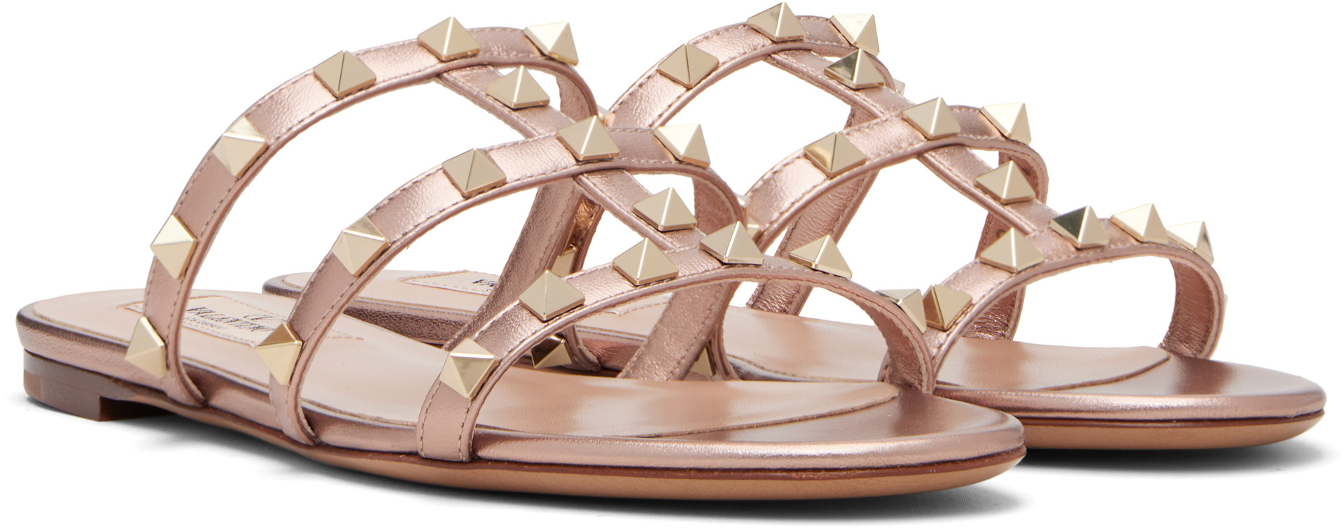 Valentino Garavani: Pink Rockstud Flat Slide Sandals | SSENSE