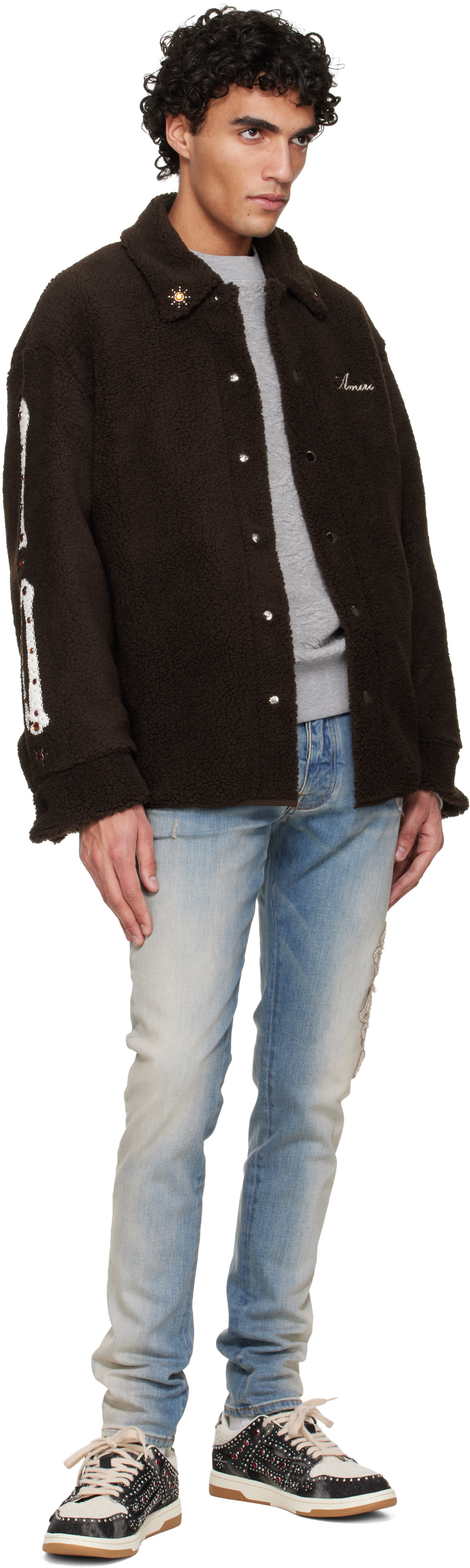 AMIRI: Blue MA Quad Applique Skinny Jeans | SSENSE
