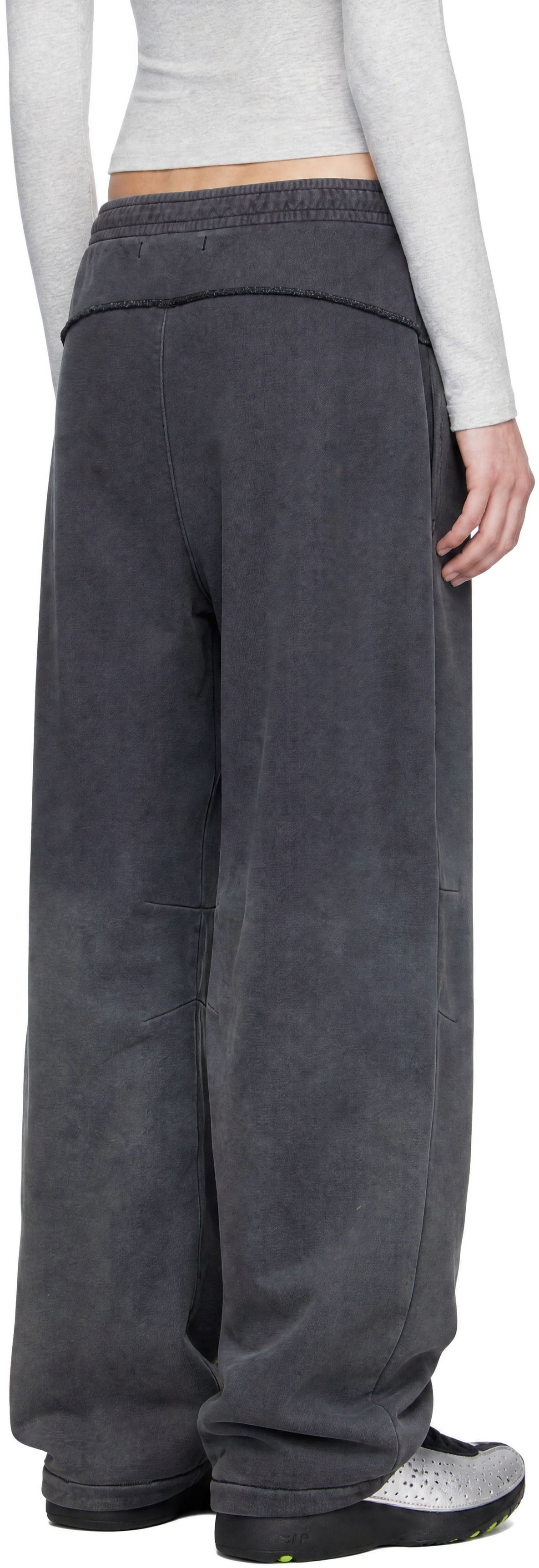 Nike - Pantalon de survêtement Studio gris