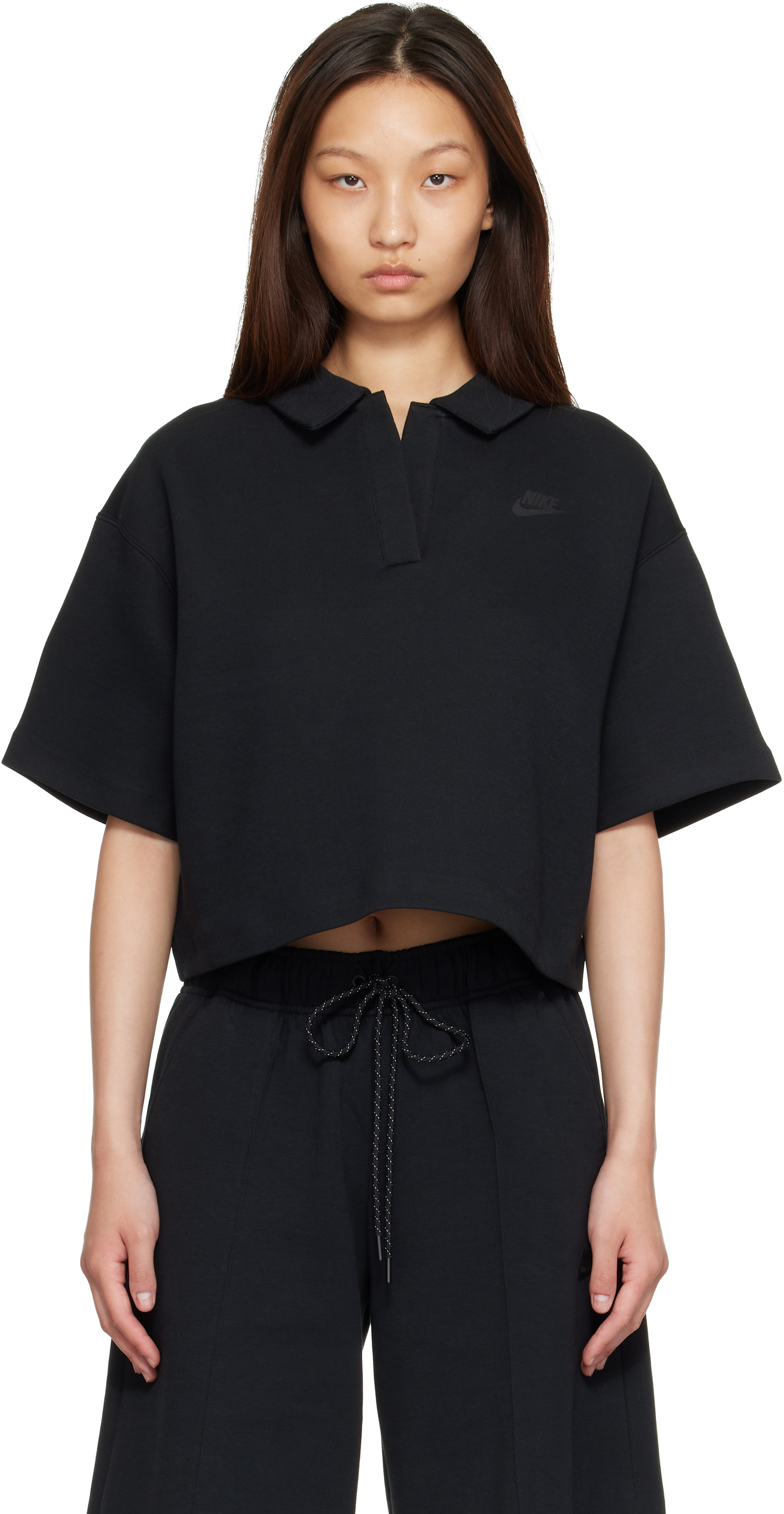 Nike - Polo de sport noir en molleton technique