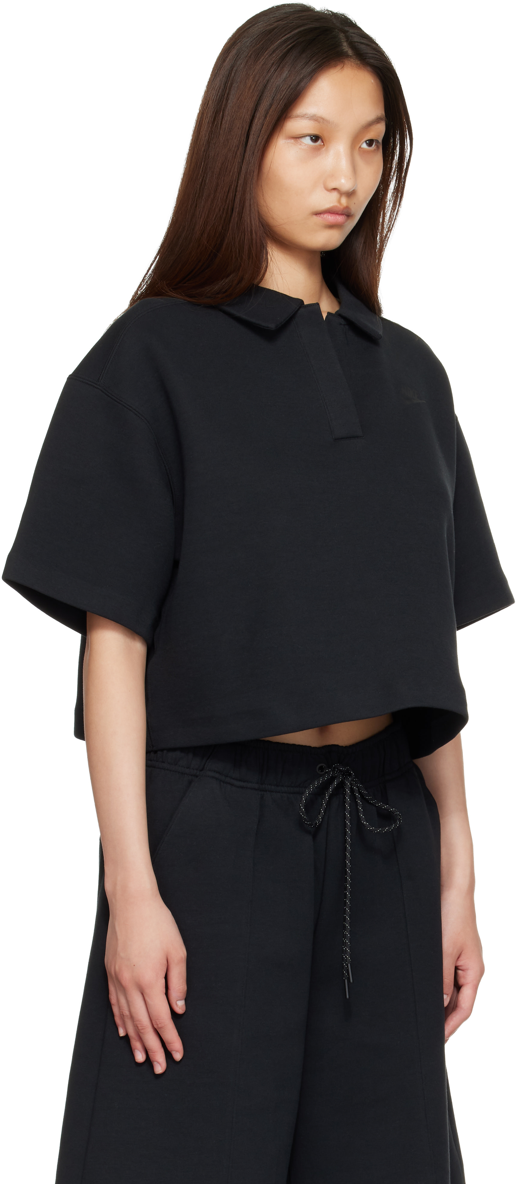 Nike - Polo de sport noir en molleton technique
