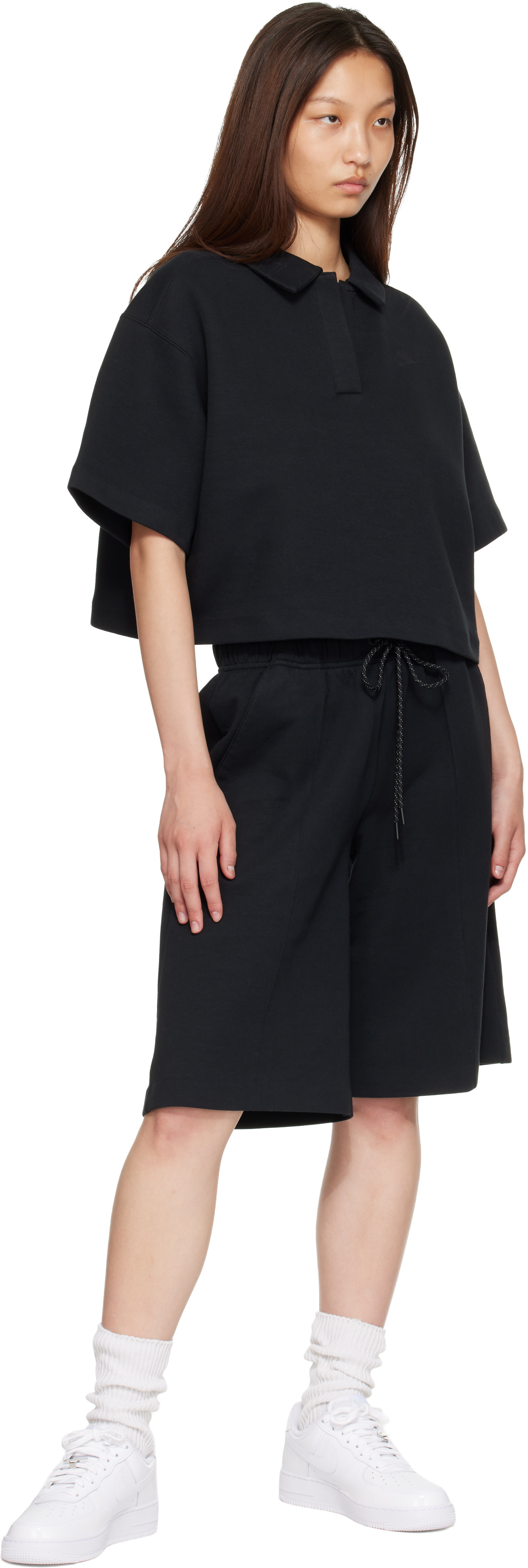 Nike - Polo de sport noir en molleton technique