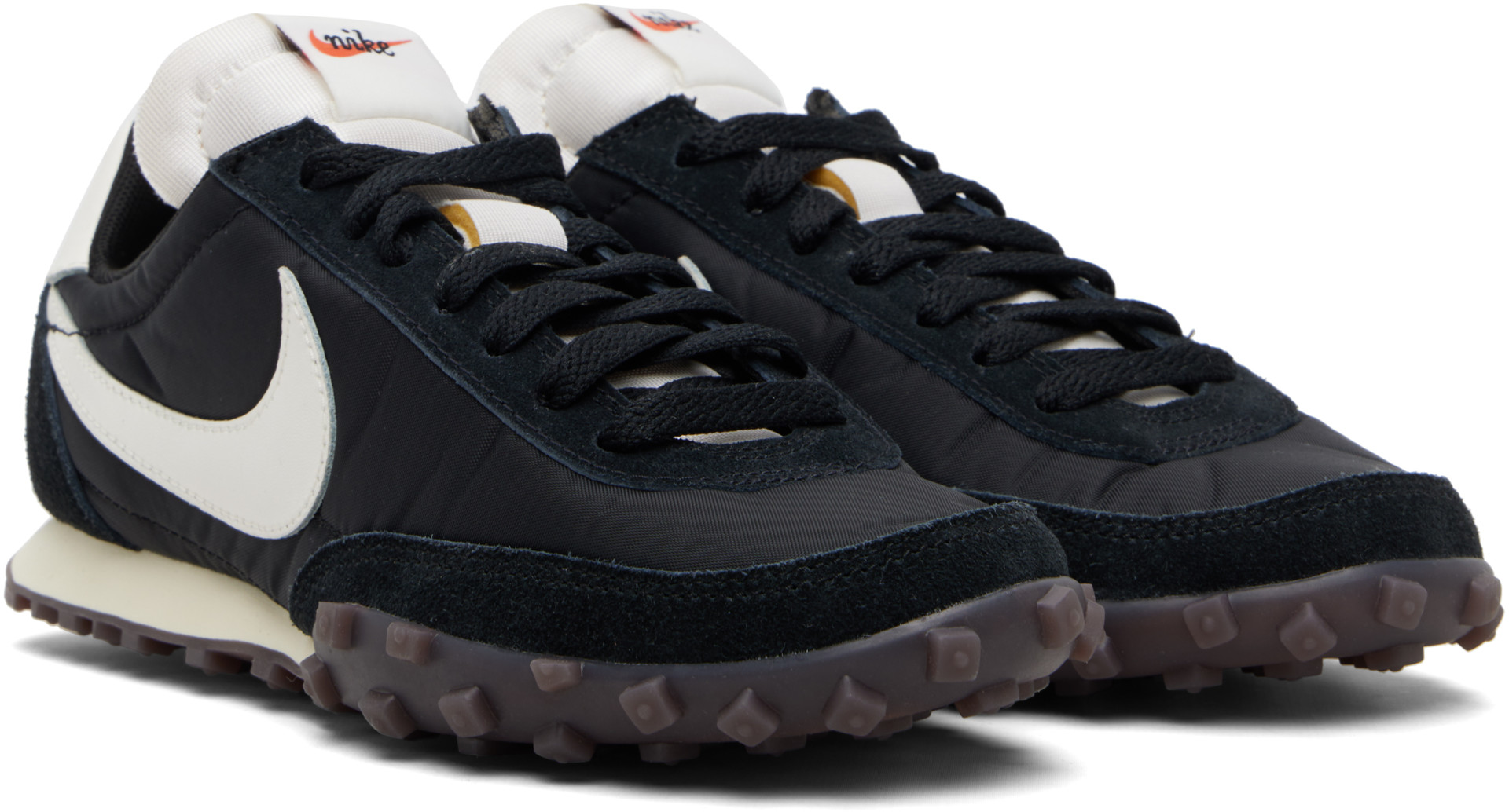Nike - Baskets de course noires à semelle gaufrée