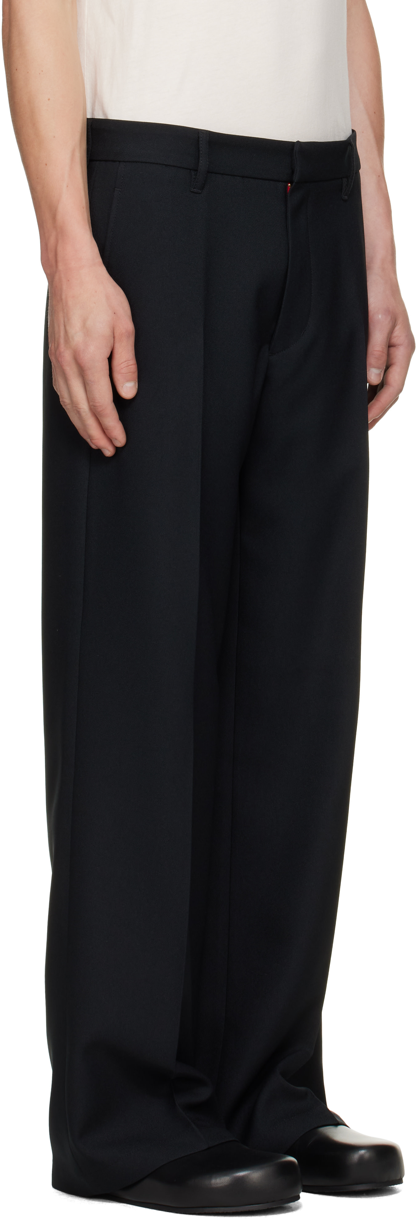 Stockholm (Surfboard) Club: Black Tailored Bootcut Trousers | SSENSE