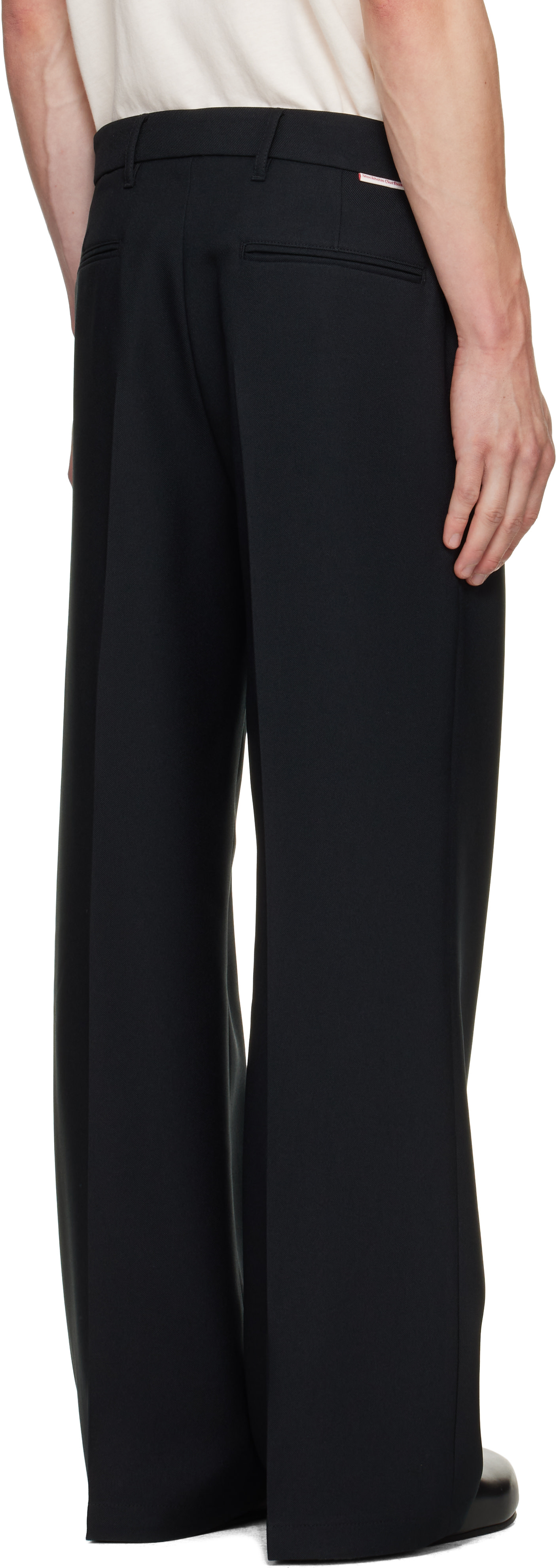 Stockholm (Surfboard) Club: Black Tailored Bootcut Trousers | SSENSE