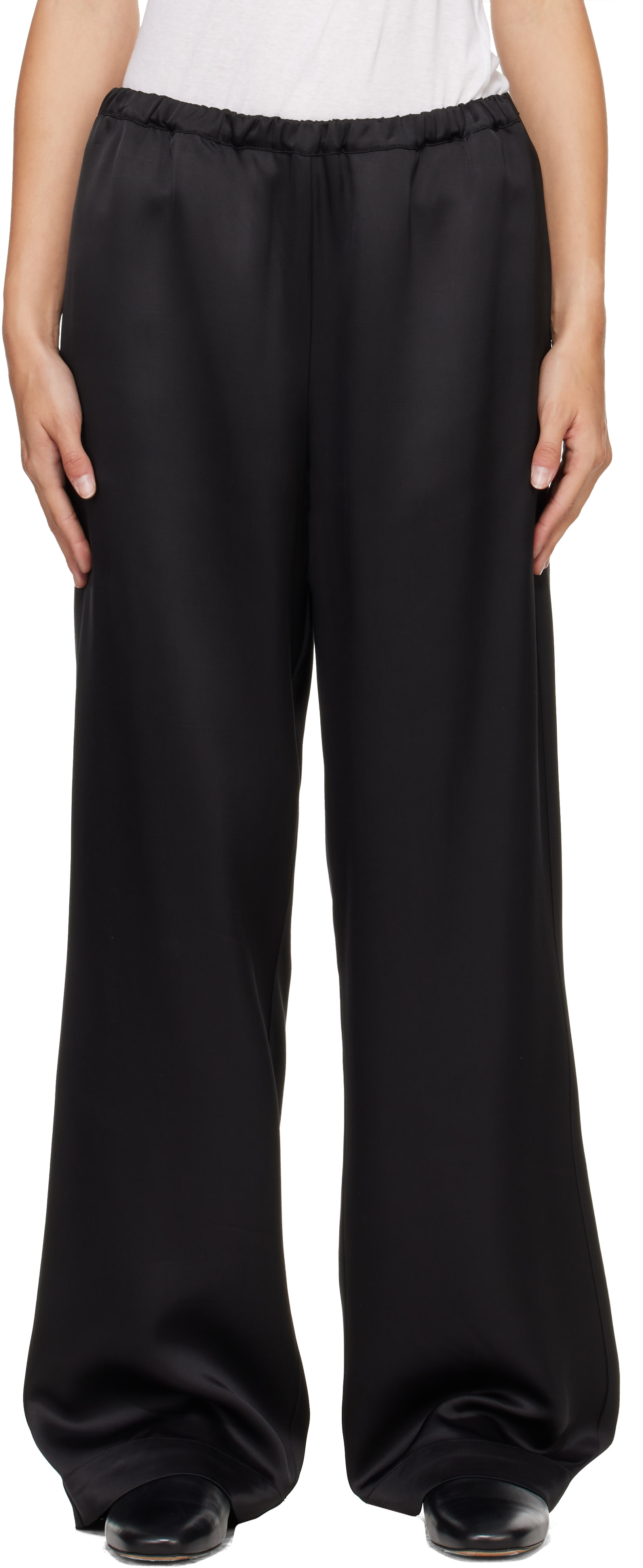 Róhe: Black Relaxed Fit Satin Trousers | SSENSE