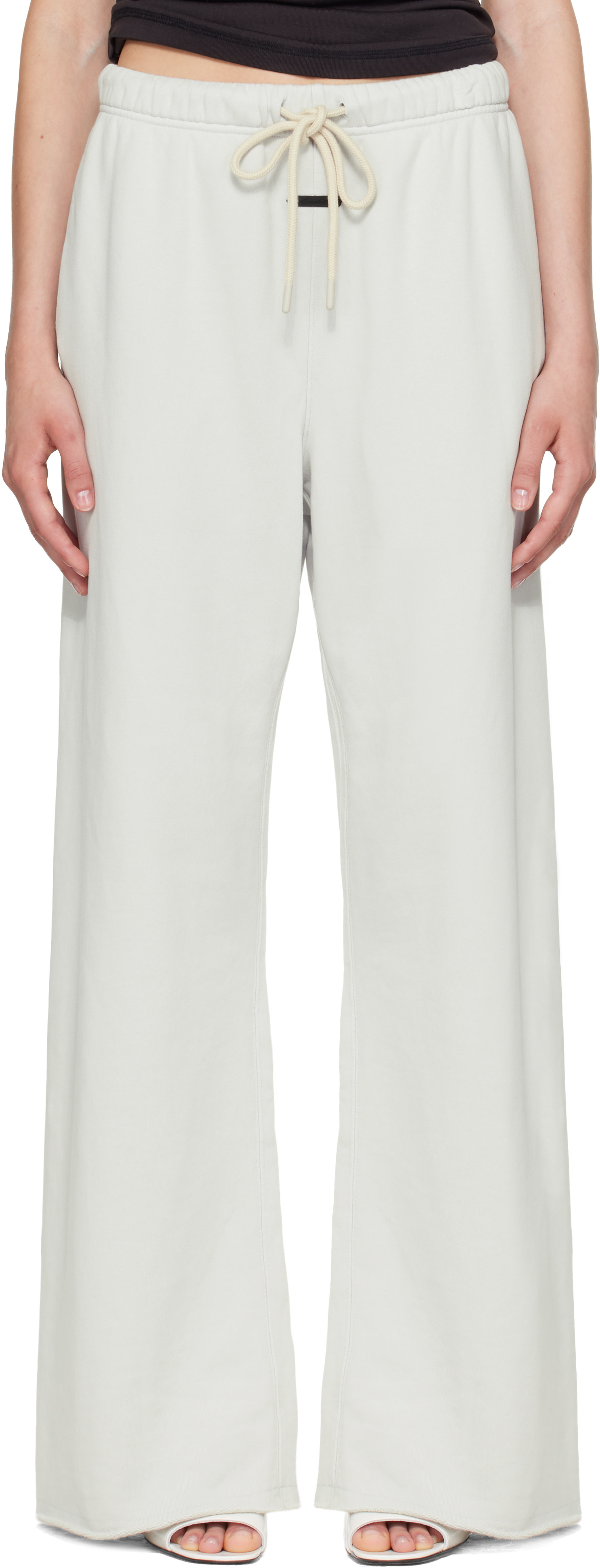 Fear of God ESSENTIALS - Pantalon de survêtement gris à bords bruts